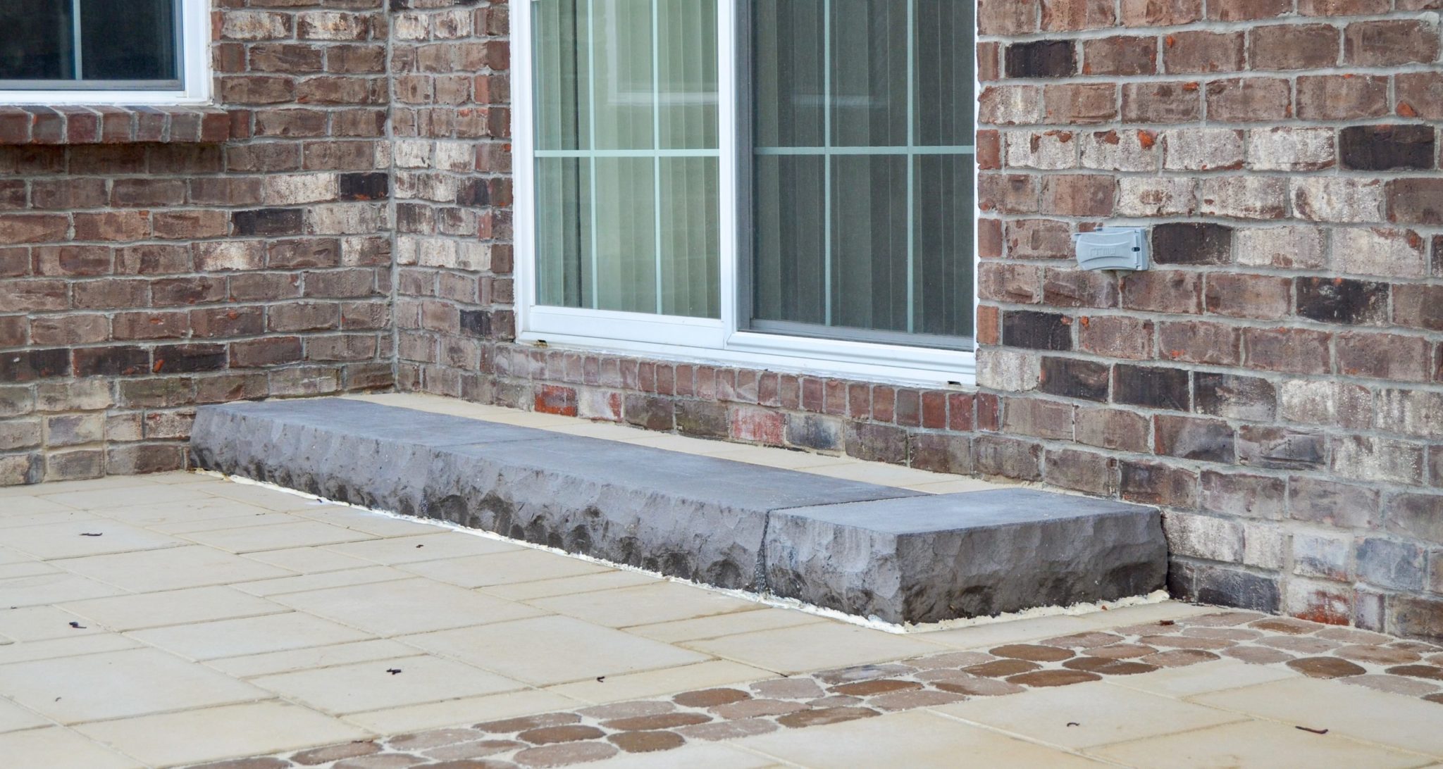 Greenwood House Side View Precision Outdoors Greenwood Indiana exterior design cedar pergola paver patio unlock belgard paver door step walkway doorstep