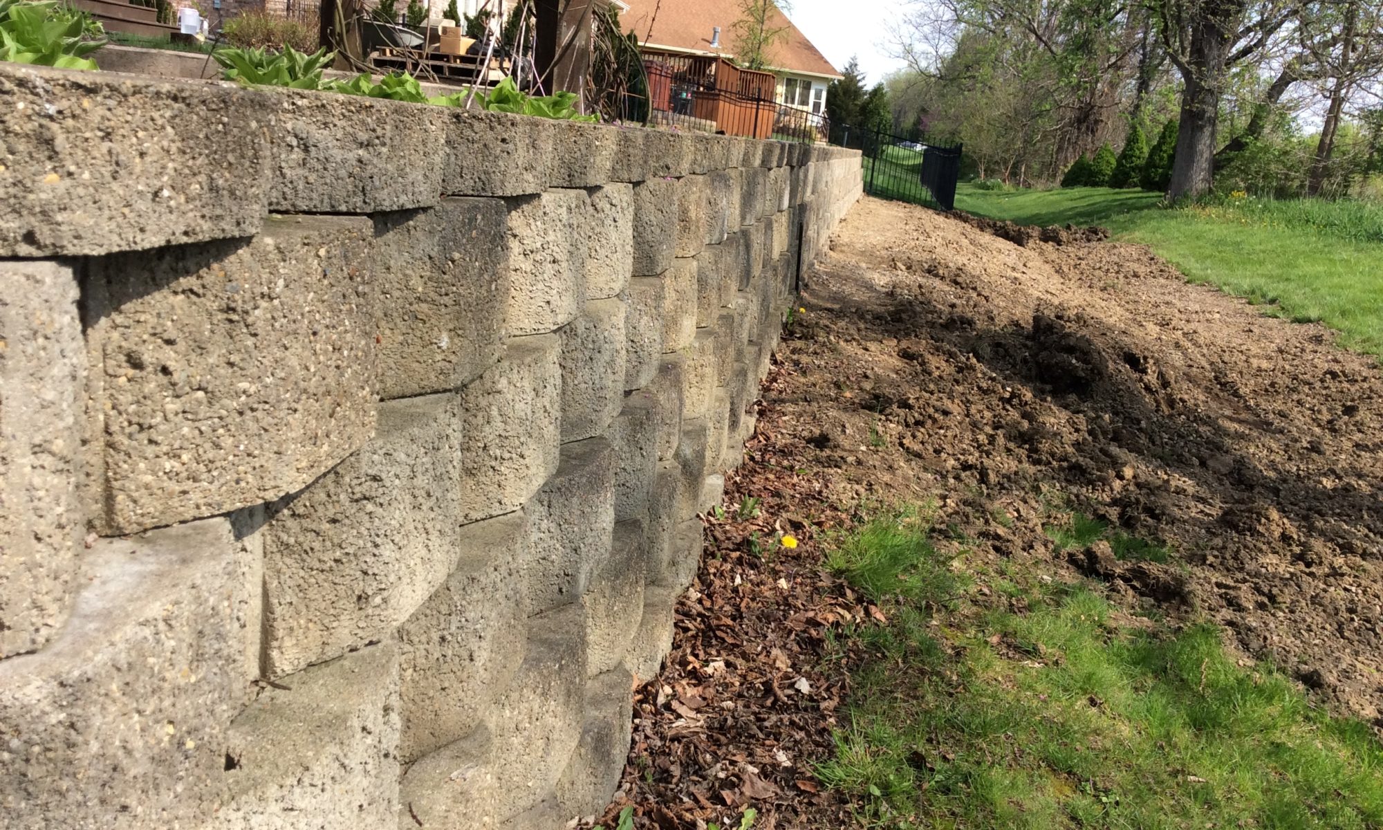Precision Outdoors Zionsville Retaining Wall rejuvenate existing landscaping indiana refresh backyard side yard