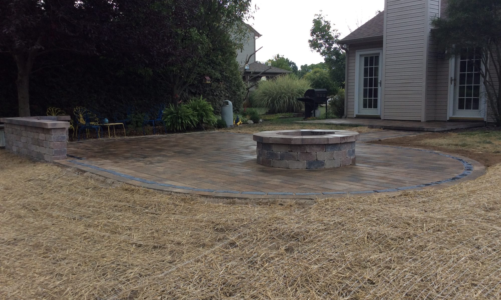 Precision Outdoors Rounded Paver Patio custom round fire pit reimagined living space Noblesville indiana