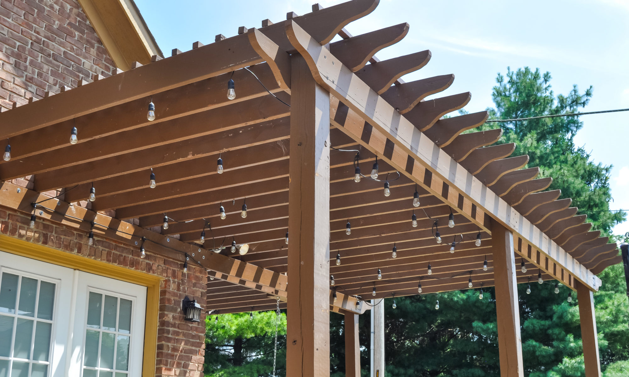 Precision Outdoors Pergola & Patio Cedar Pergola wrap around gathering entertaining custom built furniture bench swing three piece deck chair set playground pad play space simple concrete patio installation custom daybed swing Greenwood indiana