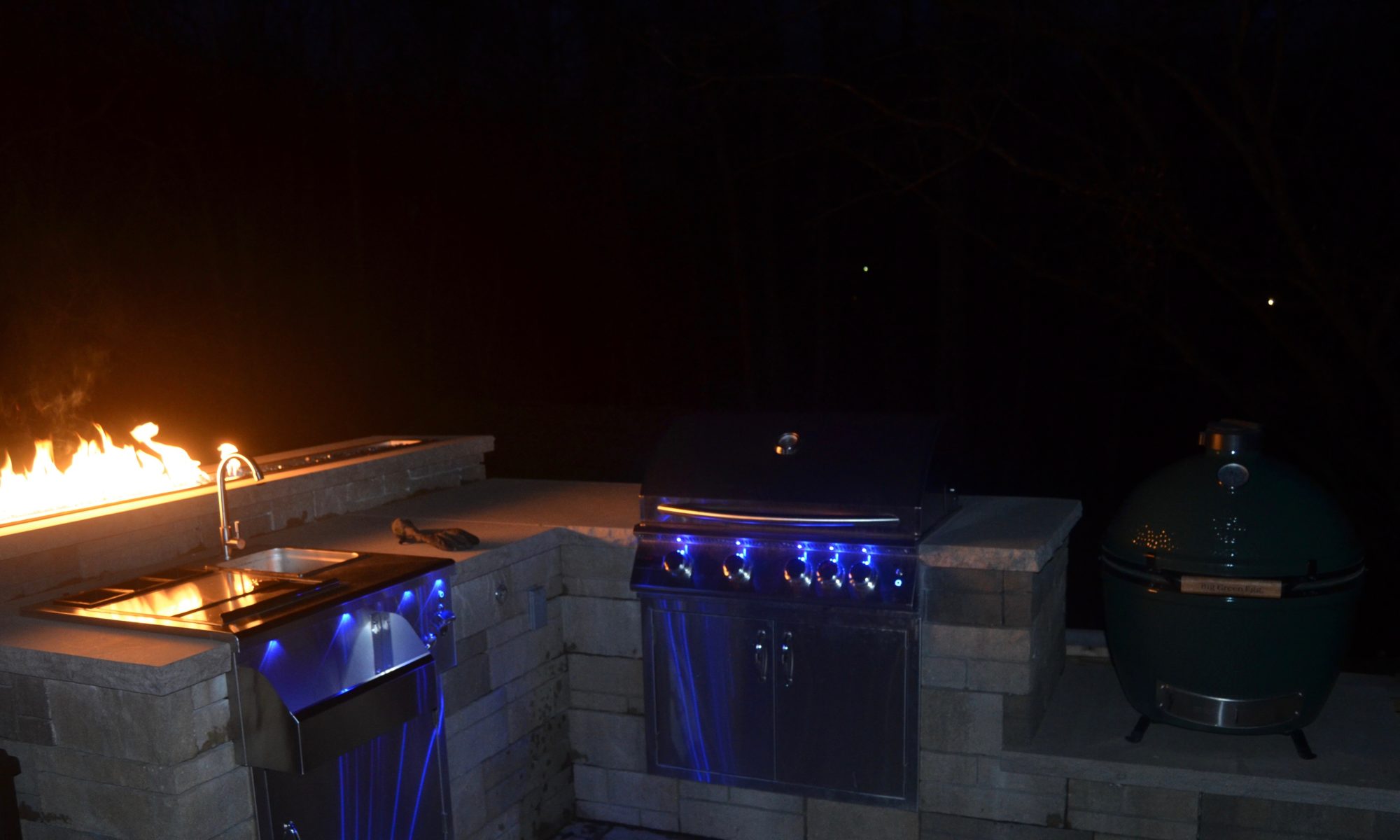 Precision Outdoors Avon Exterior Remodel built-in kitchen builtin green egg kitchen space grill sink cooking unit gas firepit fire pit space techo bloc kitchen island belgard tandem wall laffitt rustic slab retaining wall belgard anchor diamond pro unique fountain feature bubbling fire Carmel indiana dream backyard goals