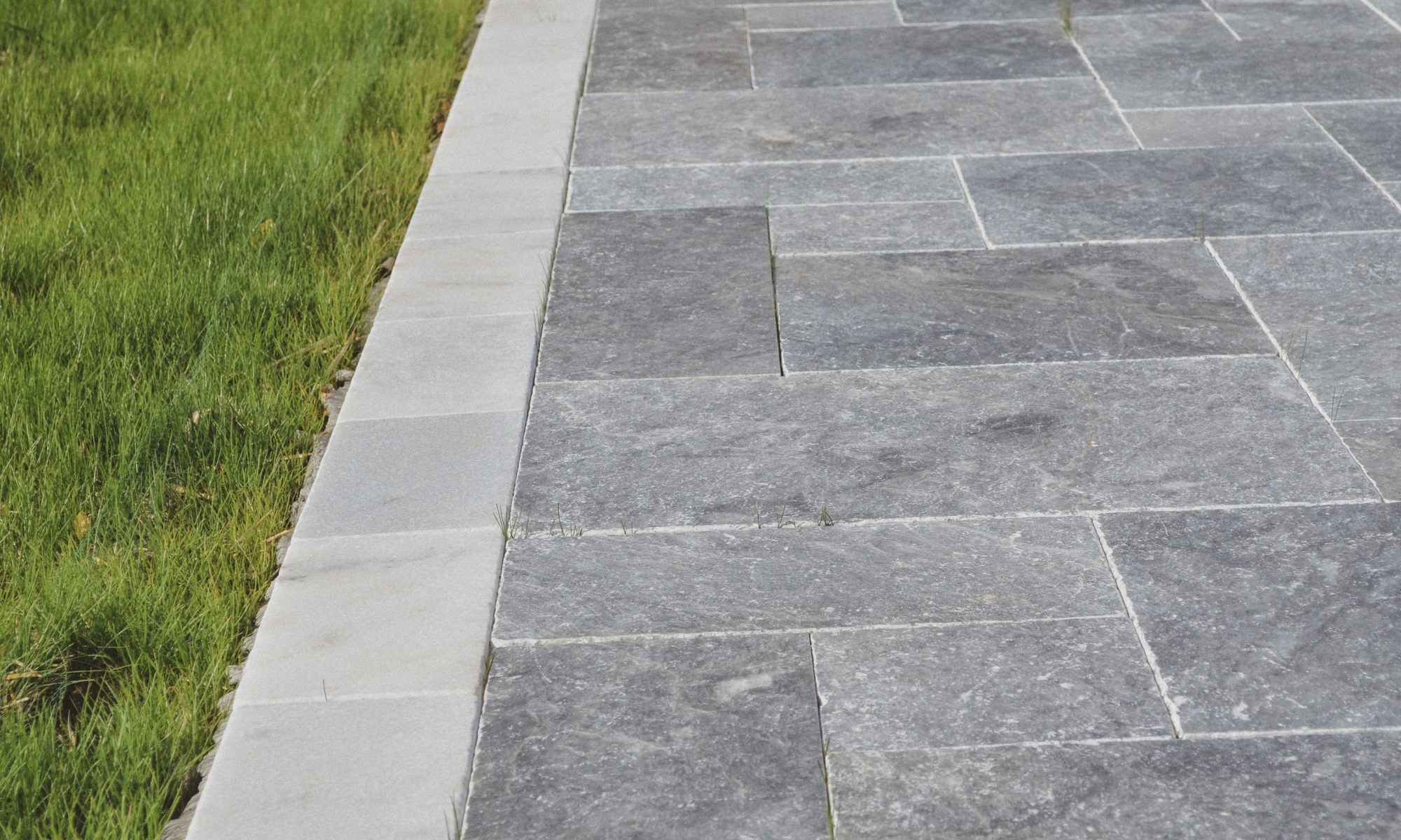 Precision Outdoors Travertine Pool Deck retaining wall limestone caps walkway path lights indianapolis indiana oberfield travertine ice marble accent strip