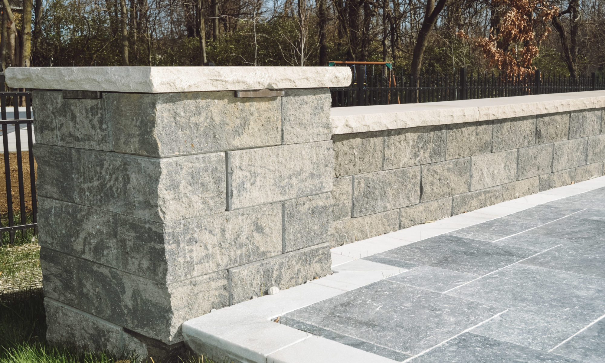 Precision Outdoors Travertine Pool Deck retaining wall limestone caps walkway path lights indianapolis indiana oberfield travertine ice marble accent strip