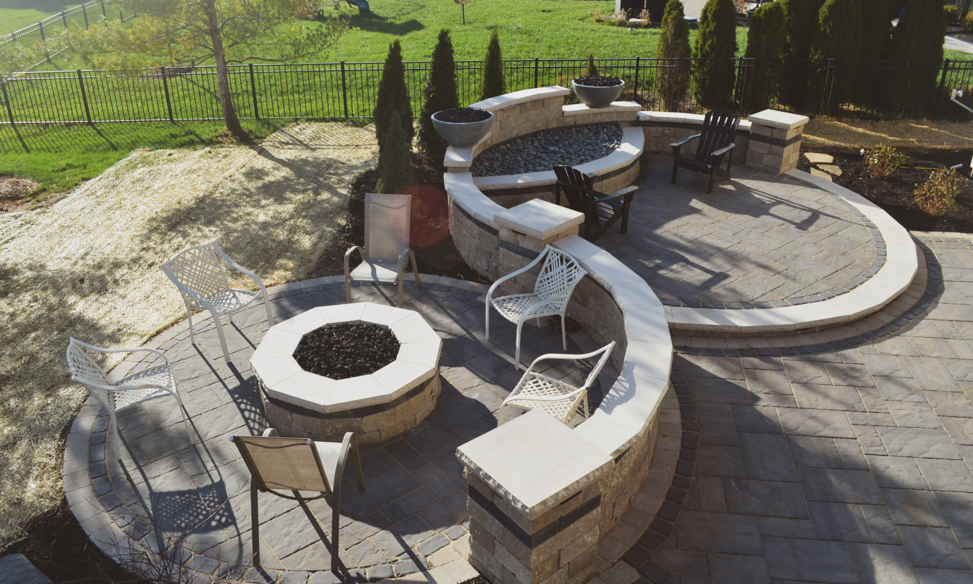 Precision Outdoor Curves of Fire gas firepit water feature two gas fire bowls unlock paver patio beacon hill flagstone alpine grey custom landscaping Noblesville indiana