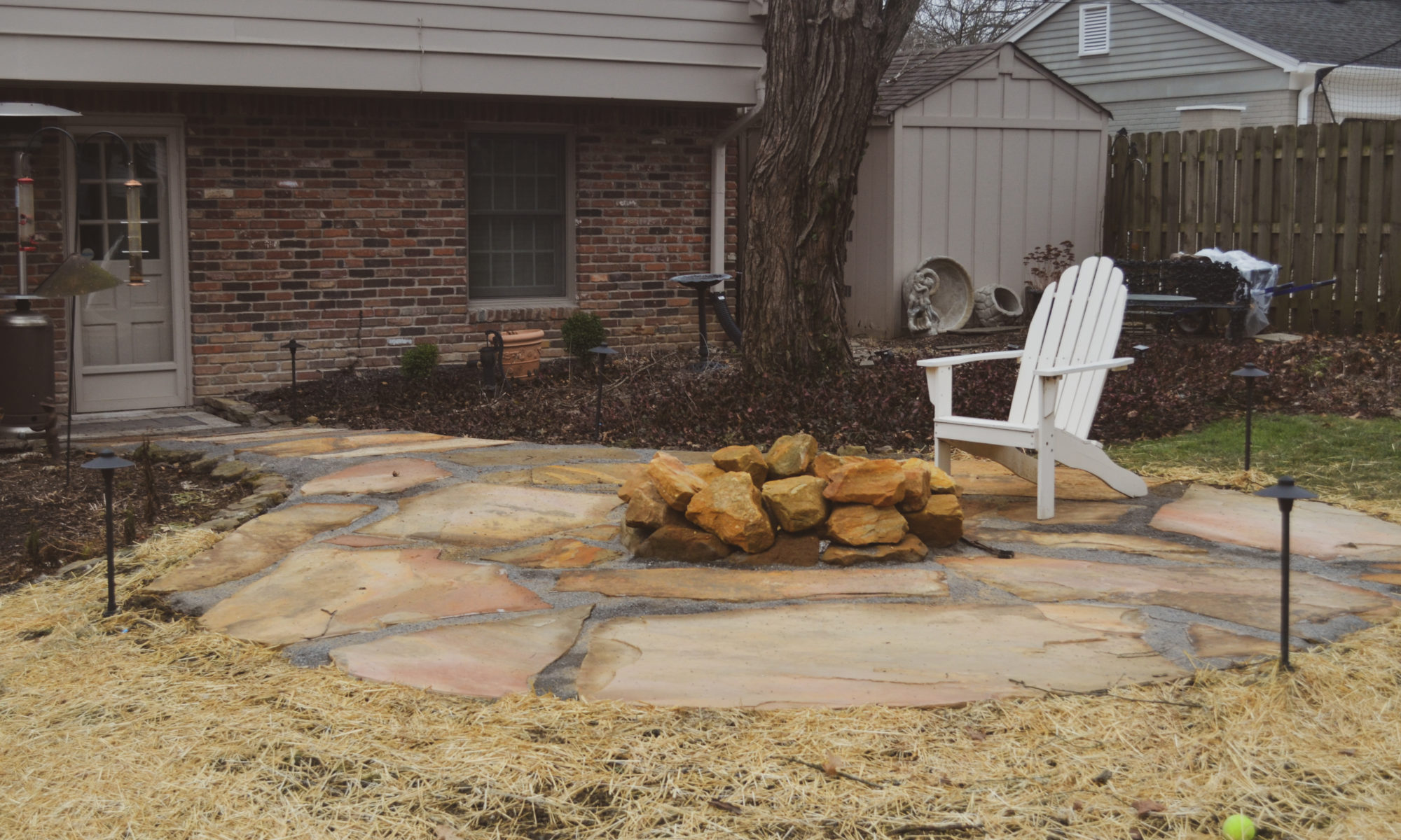 Precision Outdoors Flagstone patio and pergola cedar pergola small boulder firepit fire pit flagstone patio unlock paver patio indianapolis indiana