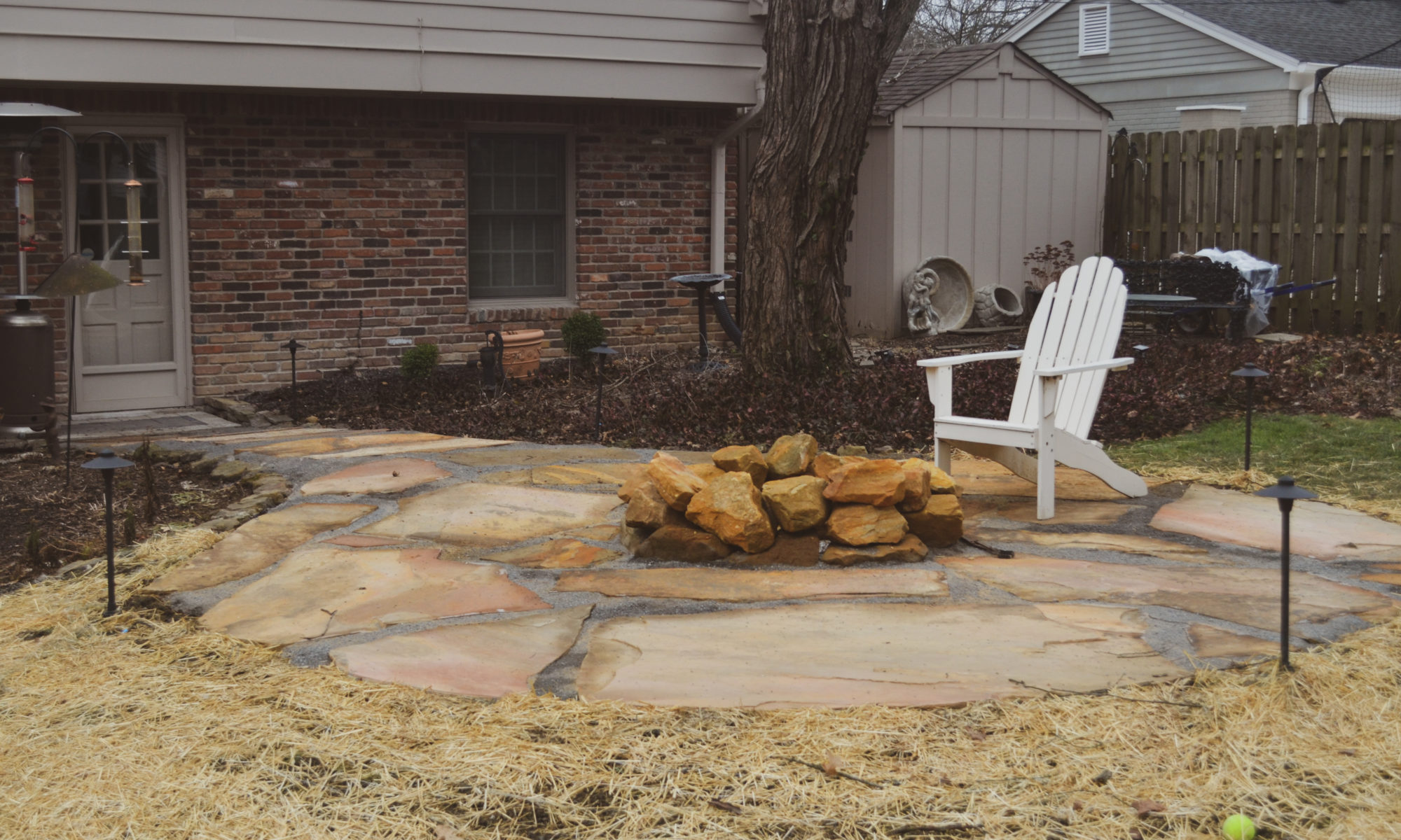 Precision Outdoors Flagstone patio and pergola cedar pergola small boulder firepit fire pit flagstone patio unlock paver patio indianapolis indiana