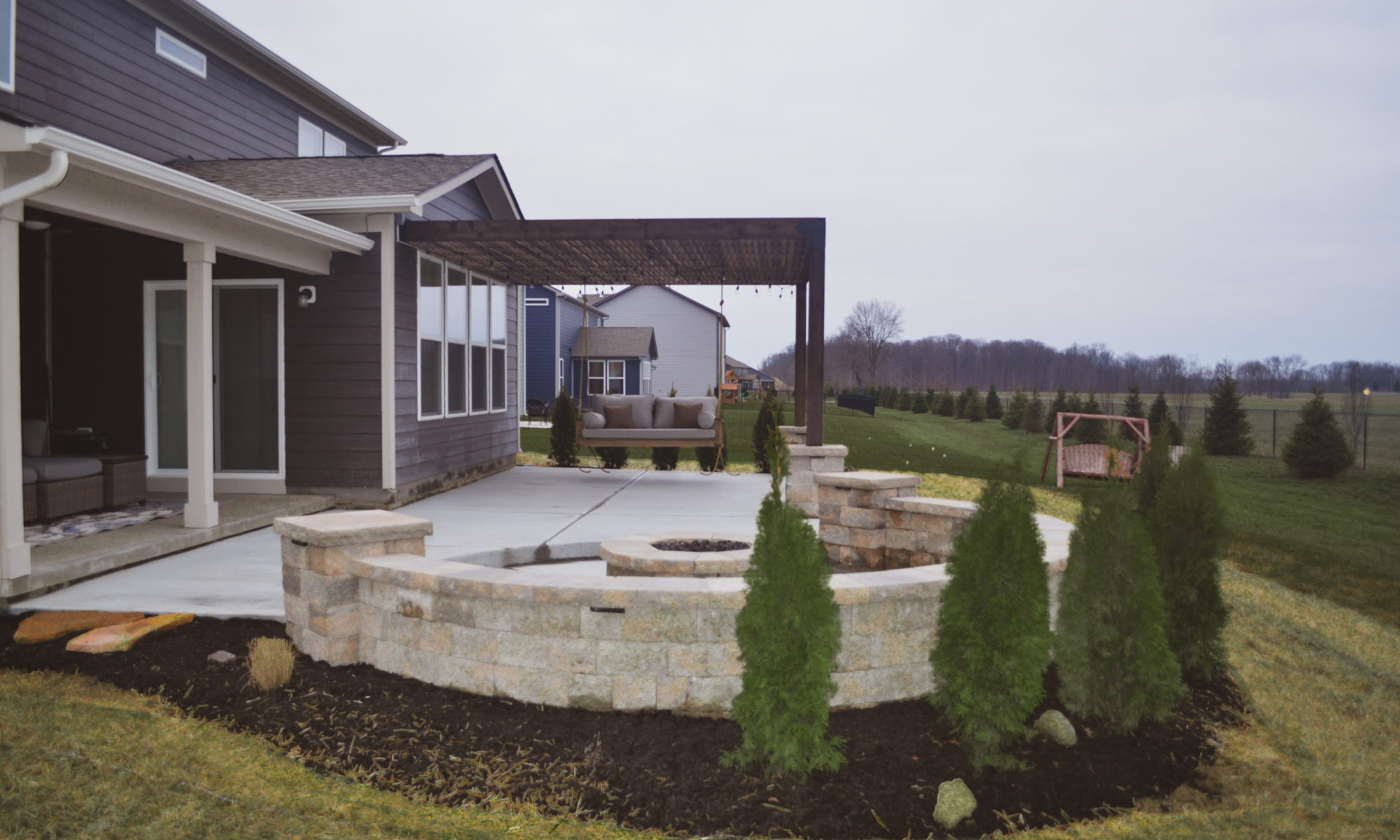 precision outdoor welchel springs pergola patio swing firepit seating wall landscaping fishers indiana