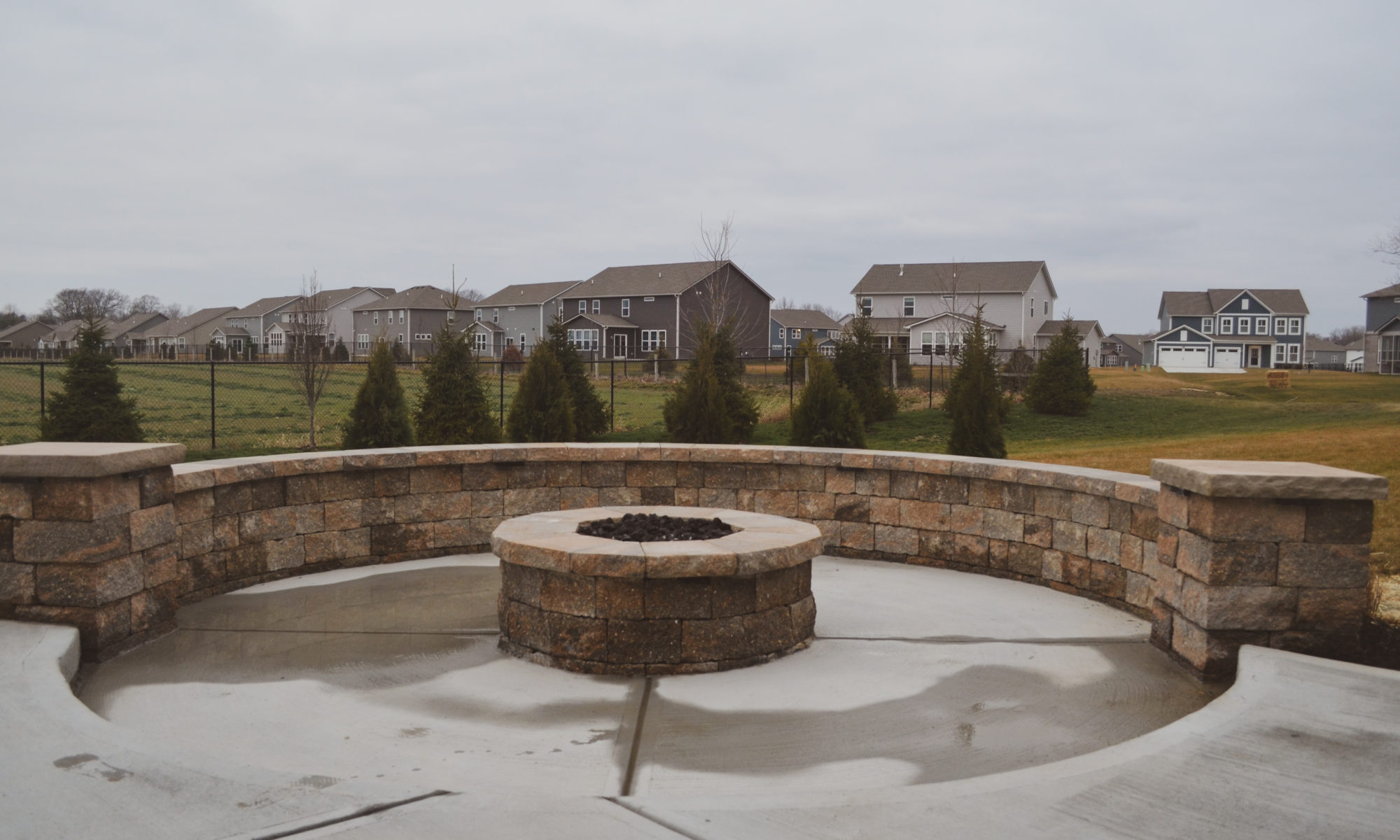 Precision Outdoors Welchel Springs Patio custom landscaping sunken gas firepit fire pit modern cedar pergola metal accents concrete patio swinging daybed day bed day swing fishers indiana beautiful backyard