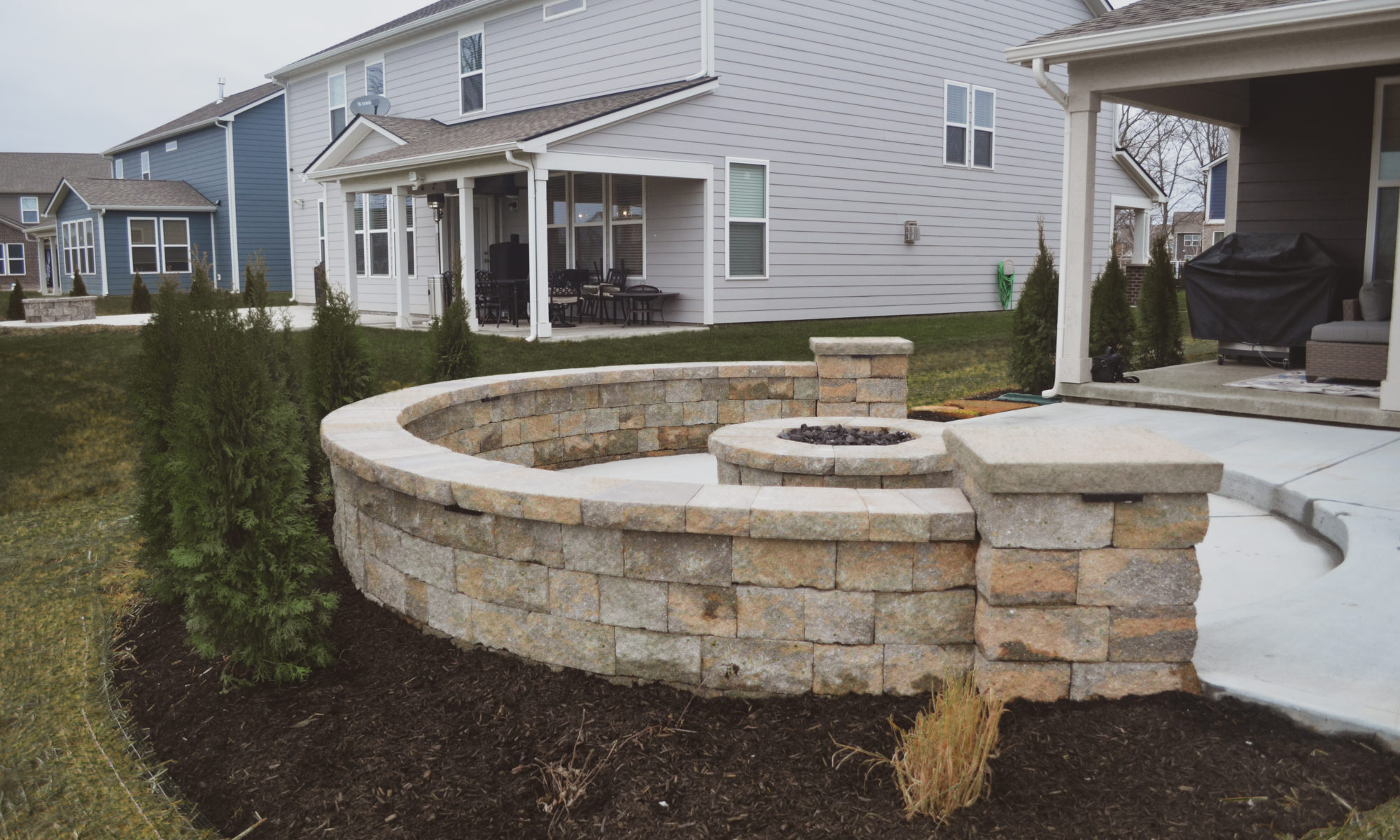 Precision Outdoors Welchel Springs Patio custom landscaping sunken gas firepit fire pit modern cedar pergola metal accents concrete patio swinging daybed day bed day swing fishers indiana beautiful backyard