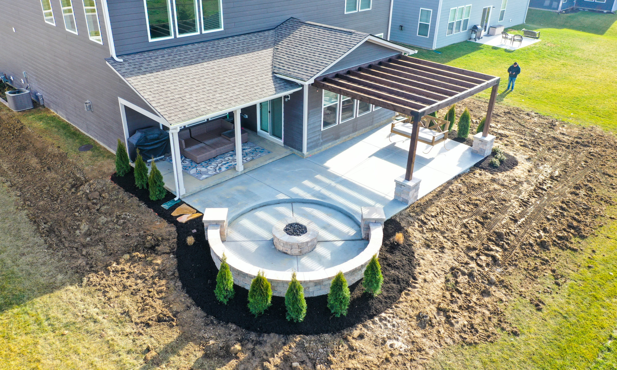 Precision Outdoors Welchel Springs Patio custom landscaping sunken gas firepit fire pit modern cedar pergola metal accents concrete patio swinging daybed day bed day swing fishers indiana beautiful backyard