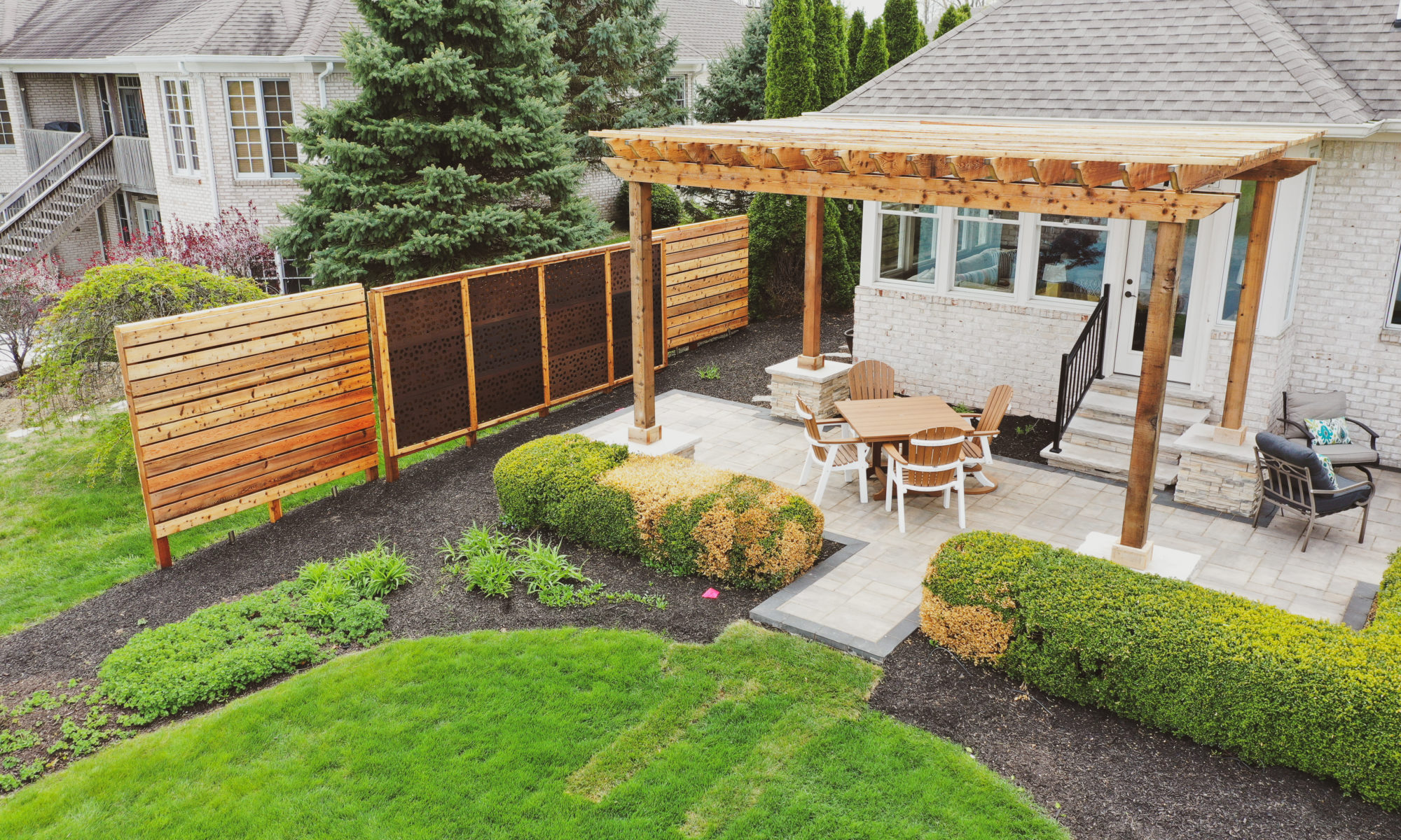 Precision Outdoors Hickory Stick Enclave cedar pergola built-in grill built in paver patio fence privacy screen screens flagstone walkway Bargersville Greenwood Indiana