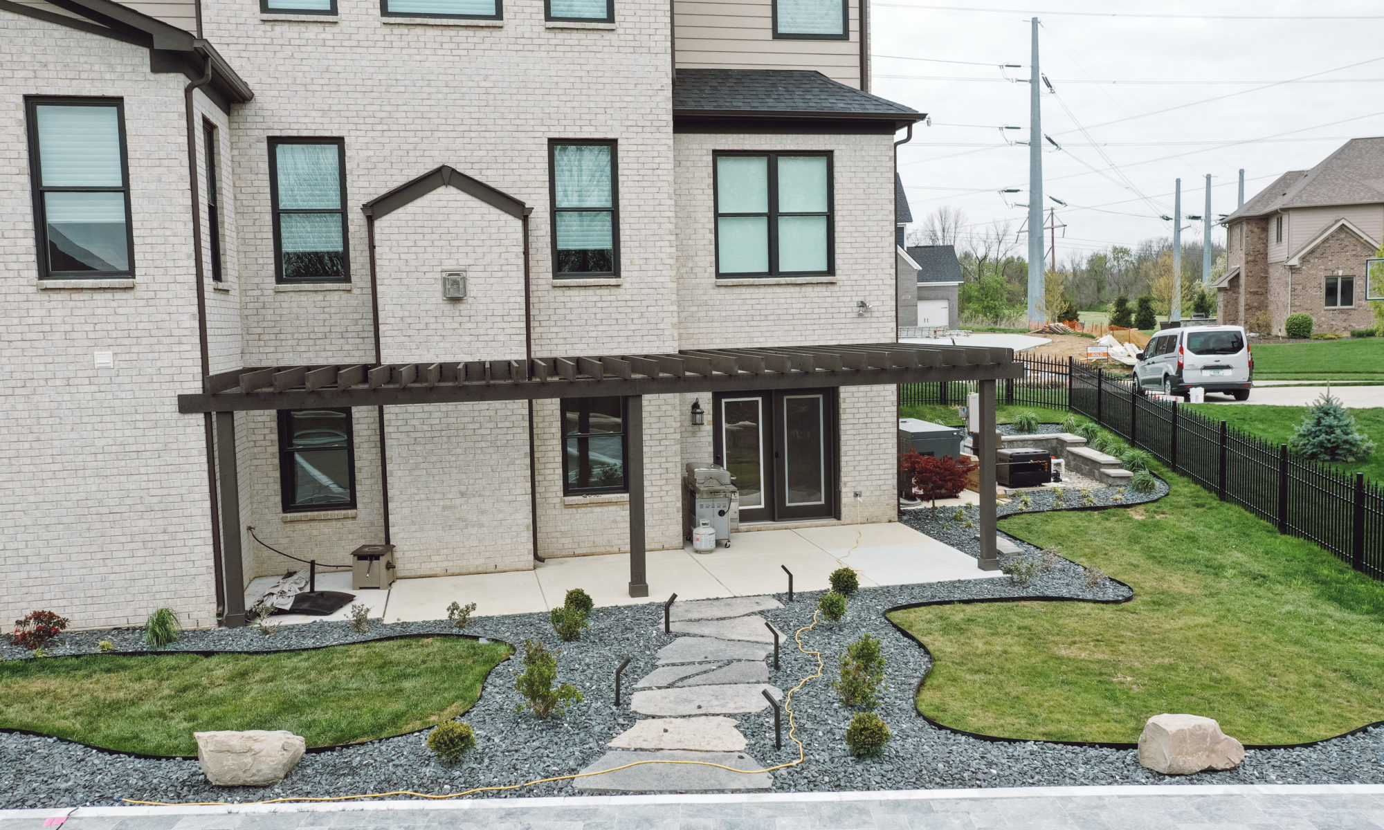 Precision Outdoors Travertine Pool Deck retaining wall limestone caps walkway path lights indianapolis indiana oberfield travertine ice marble accent strip overfilled versalok versa-lok granite blend taho marble