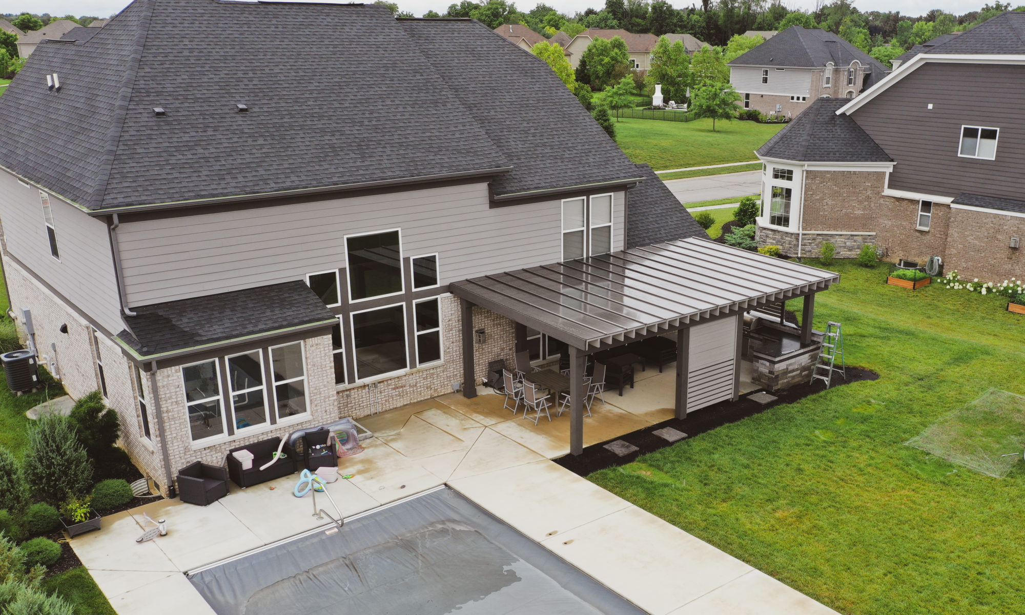 Precision Outdoors Modern Covered Pergola plexiglass covering grill island decorative privacy screens concrete patio Bargersville indiana