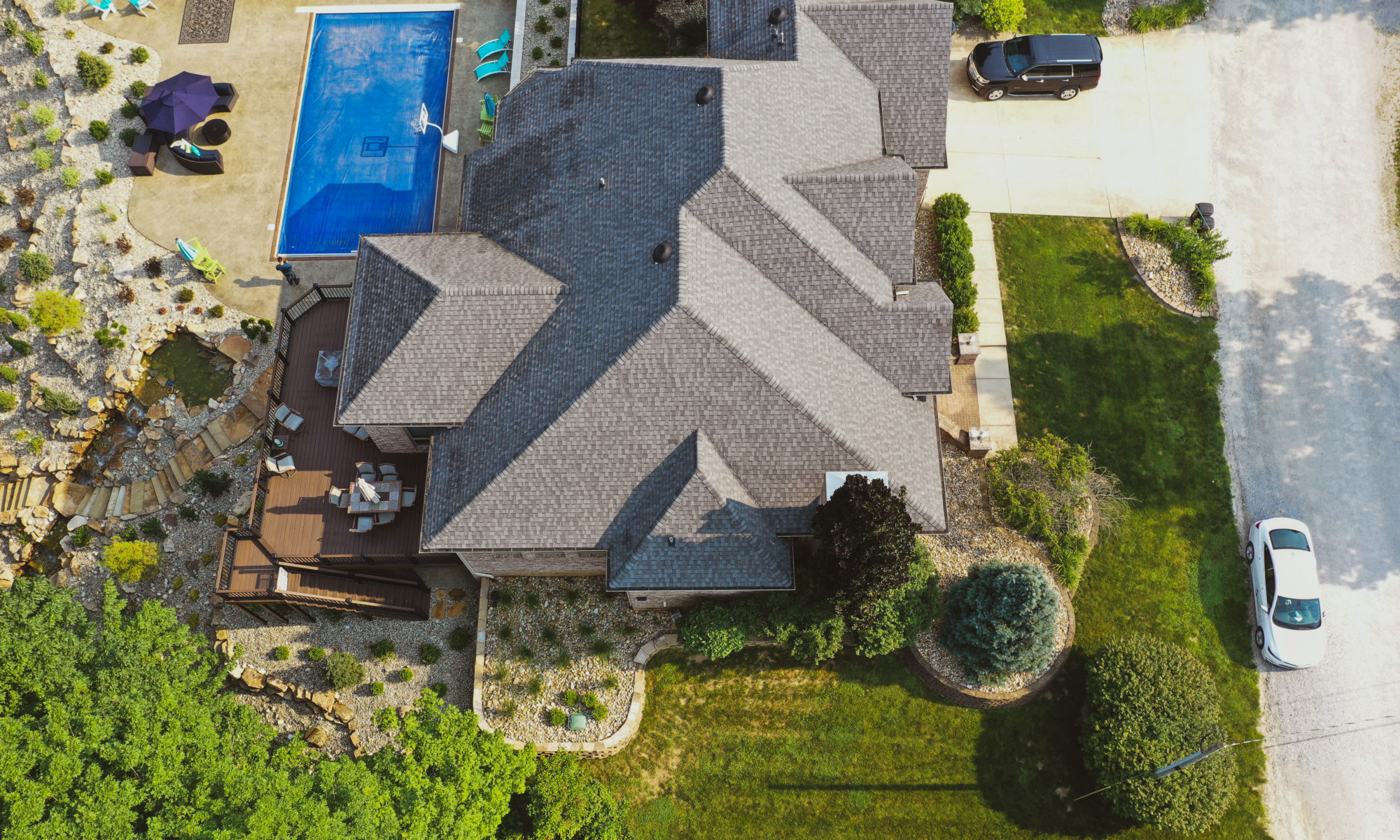 Precision Outdoors the epic waterfall rocks boulders stairs outdoor dream backyard fire pit pool waterfall indianapolis indiana seating wall amazing basketball court landscaping