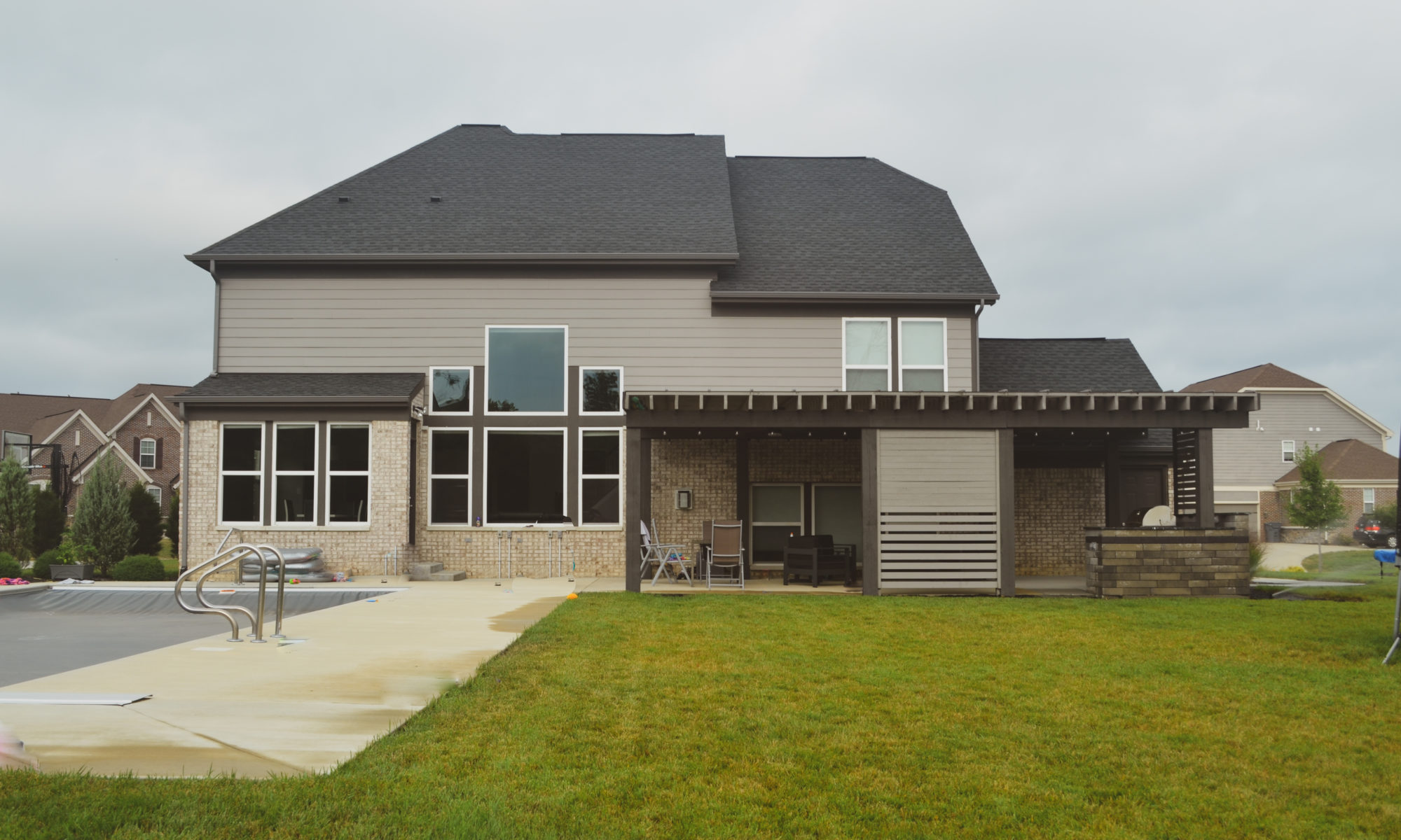 Precision Outdoors Modern Covered Pergola plexiglass covering grill island decorative privacy screens concrete patio Bargersville indiana