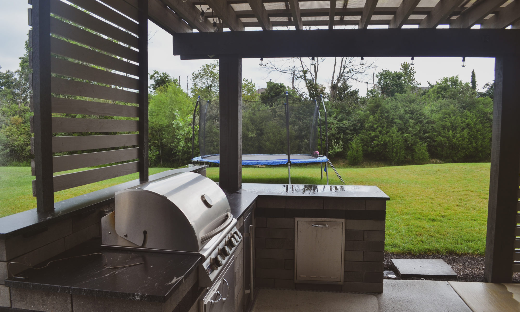 Precision Outdoors Modern Covered Pergola plexiglass covering grill island decorative privacy screens concrete patio Bargersville indiana