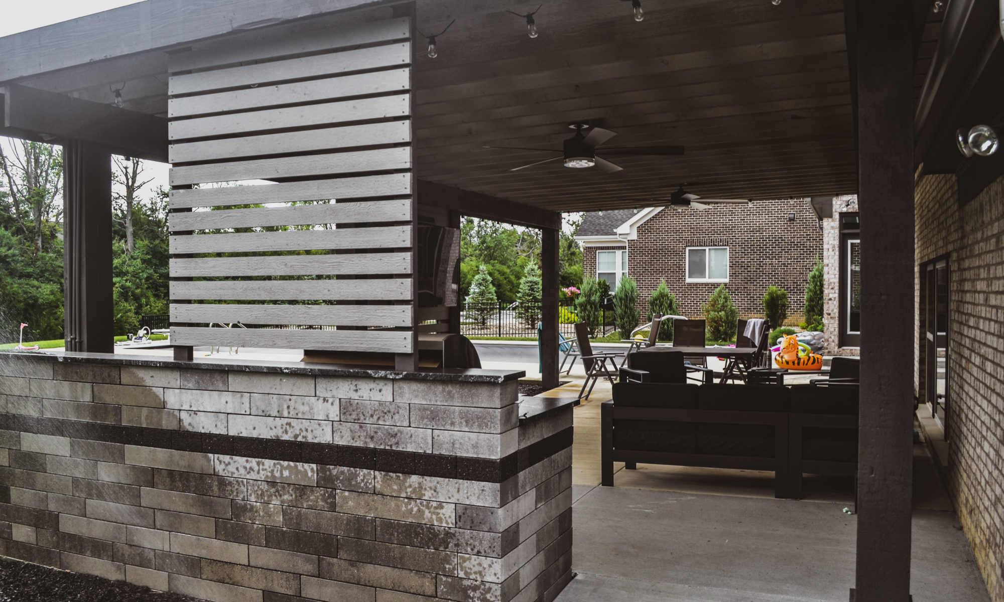 Precision Outdoors Modern Covered Pergola plexiglass covering grill island decorative privacy screens concrete patio Bargersville indiana