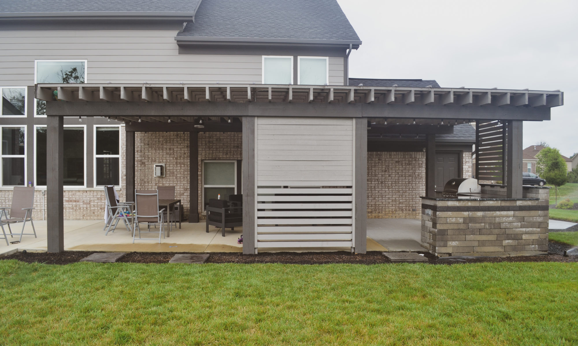 Precision Outdoors Modern Covered Pergola plexiglass covering grill island decorative privacy screens concrete patio Bargersville indiana
