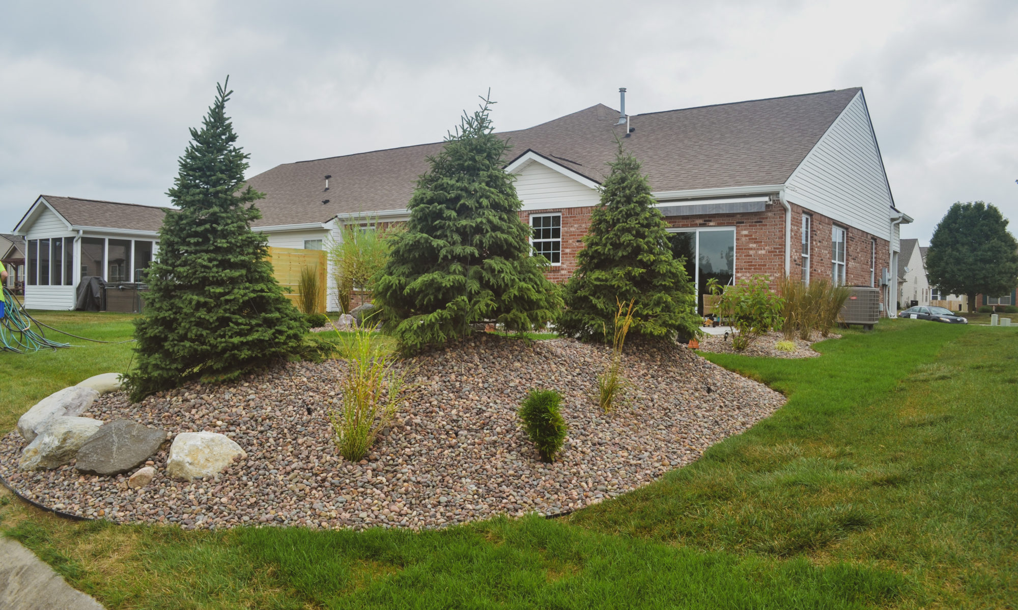 Precision Outdoors Bluestone Paver Patio Custom Landscaping River Rock Indianapolis Indiana beautiful landscaping