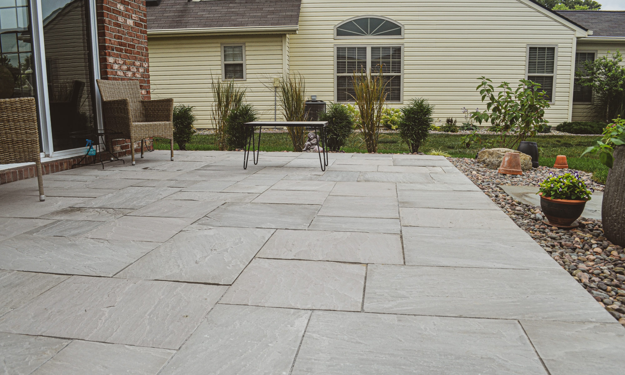 Precision Outdoors Bluestone Paver Patio Custom Landscaping River Rock Indianapolis Indiana beautiful landscaping