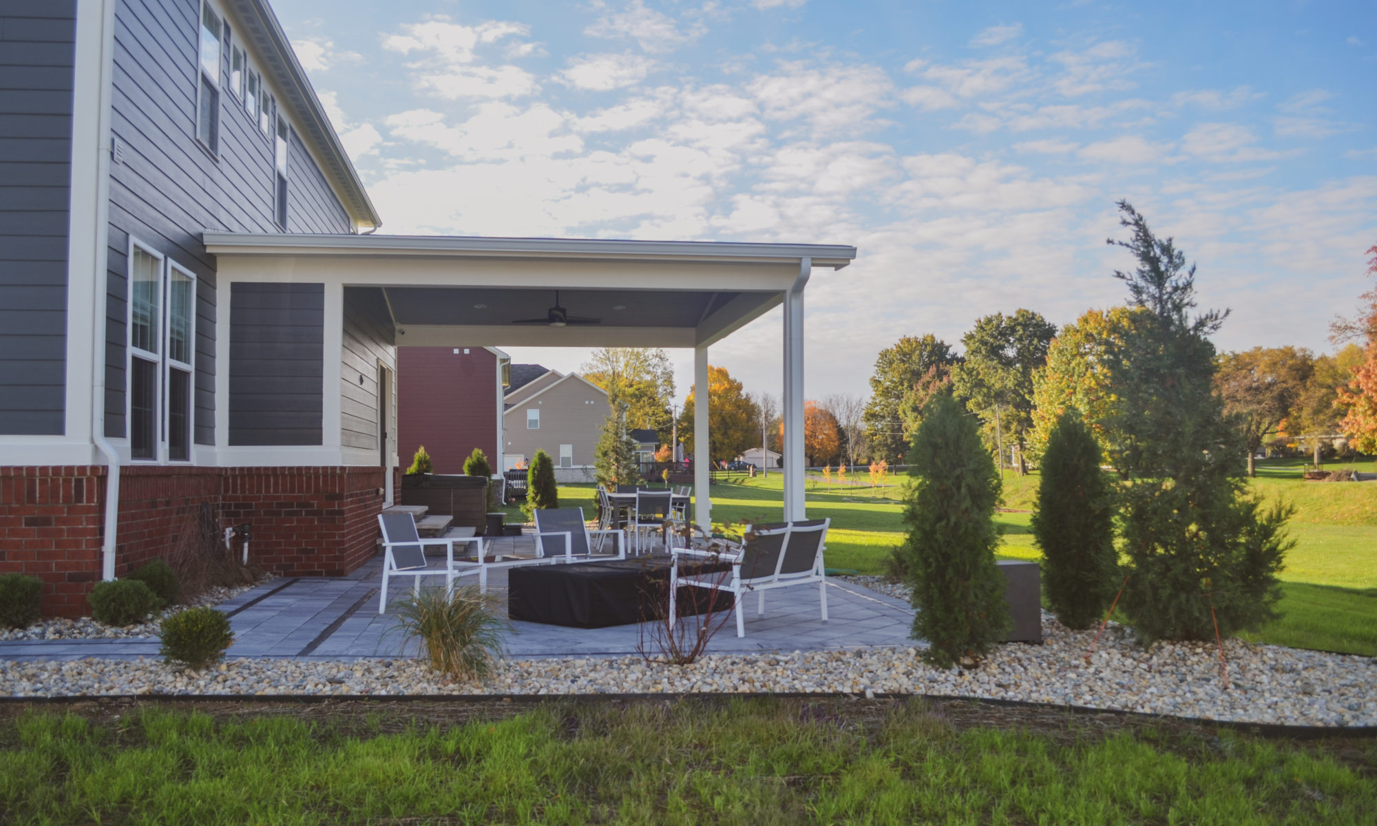 Precision Outdoors Classic Paver and firepit gable roof structure linear gas firepit paver patio custom landscaping Greenwood Indiana