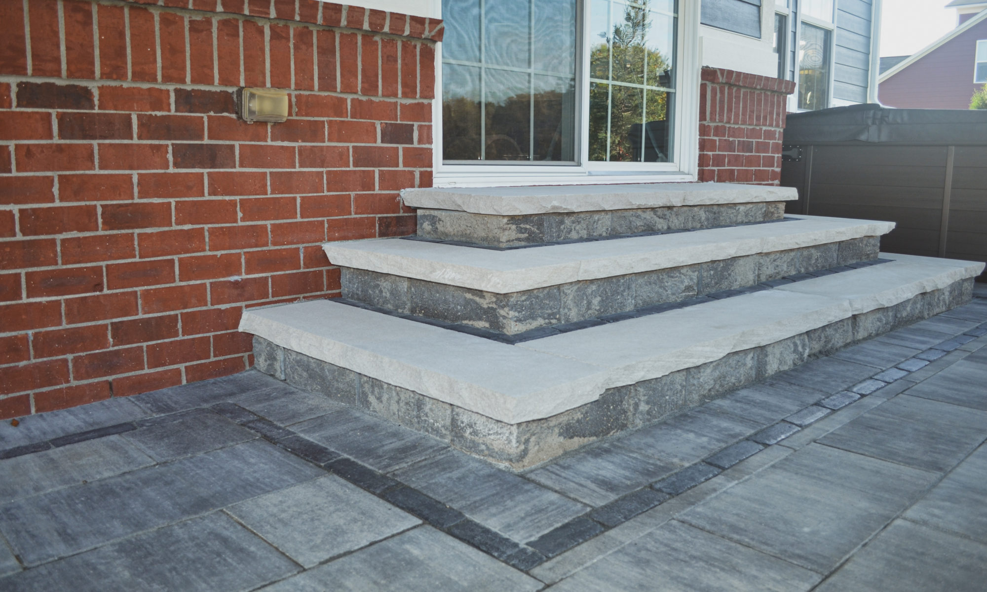 Precision Outdoors Classic Paver and firepit gable roof structure linear gas firepit paver patio custom landscaping Greenwood Indiana
