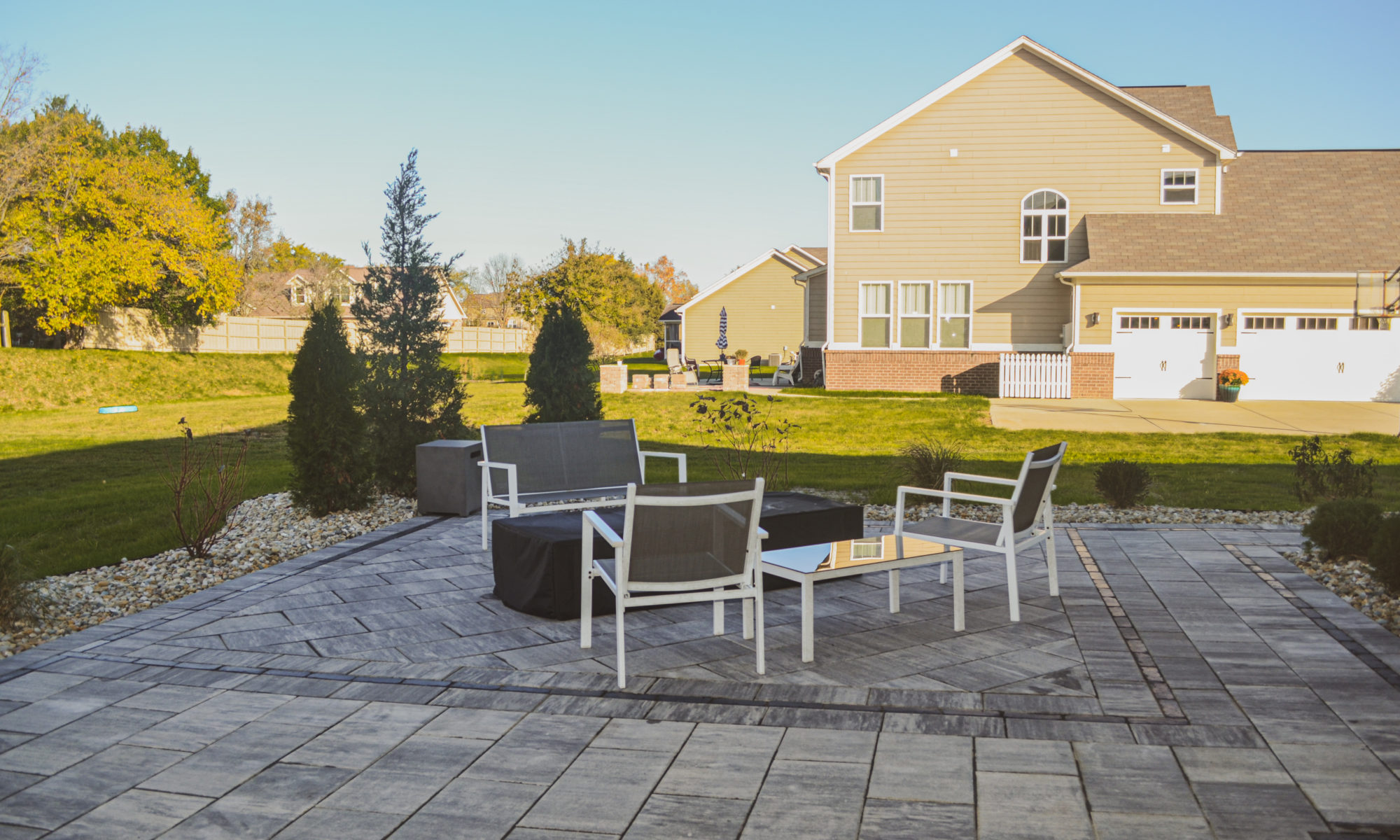 Precision Outdoors Classic Paver and firepit gable roof structure linear gas firepit paver patio custom landscaping Greenwood Indiana