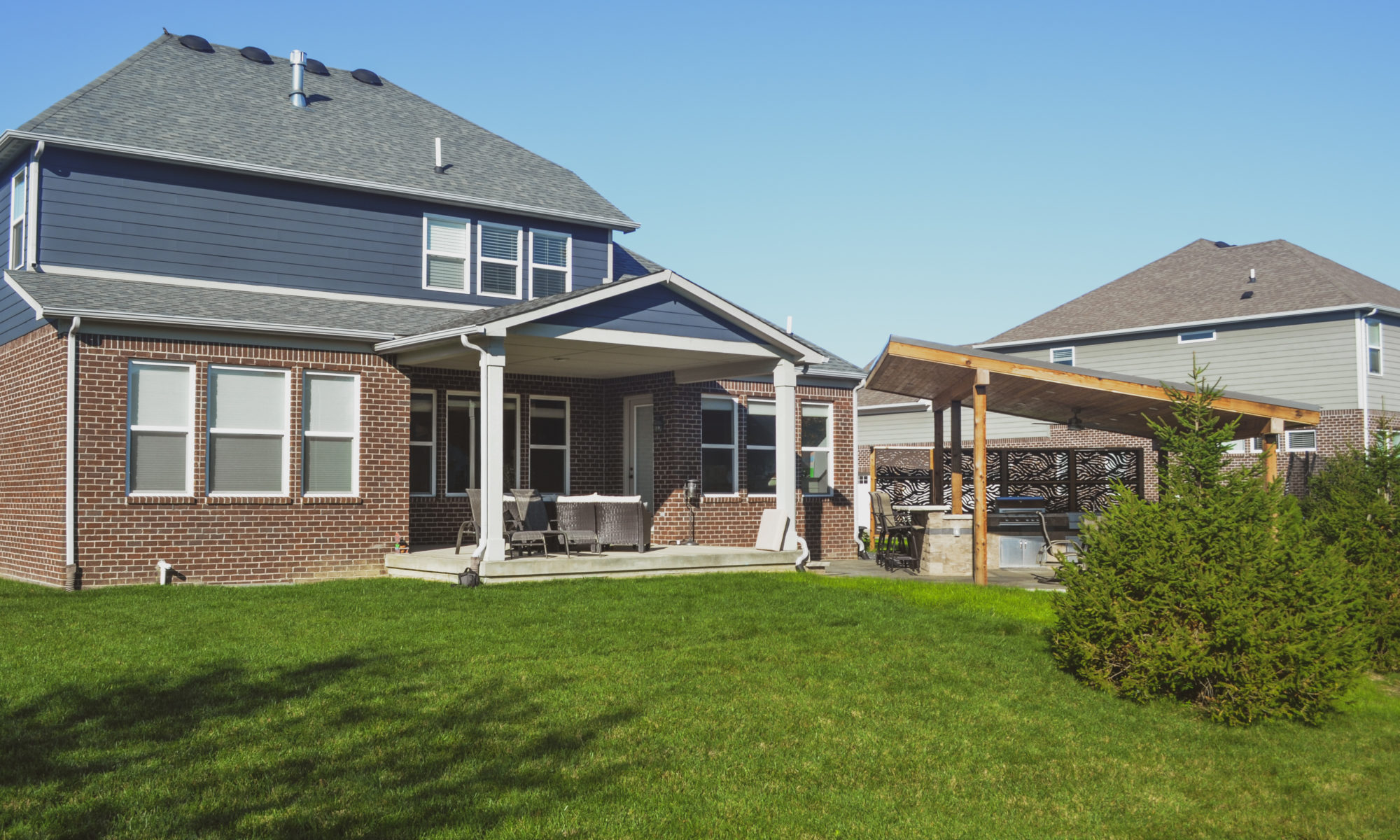 Precision Outdoors Emerald Ridge Hideaway shed roof structure paver patio outdoor kitchen barter seating privacy screens walking stone indianapolis indiana privacy screens