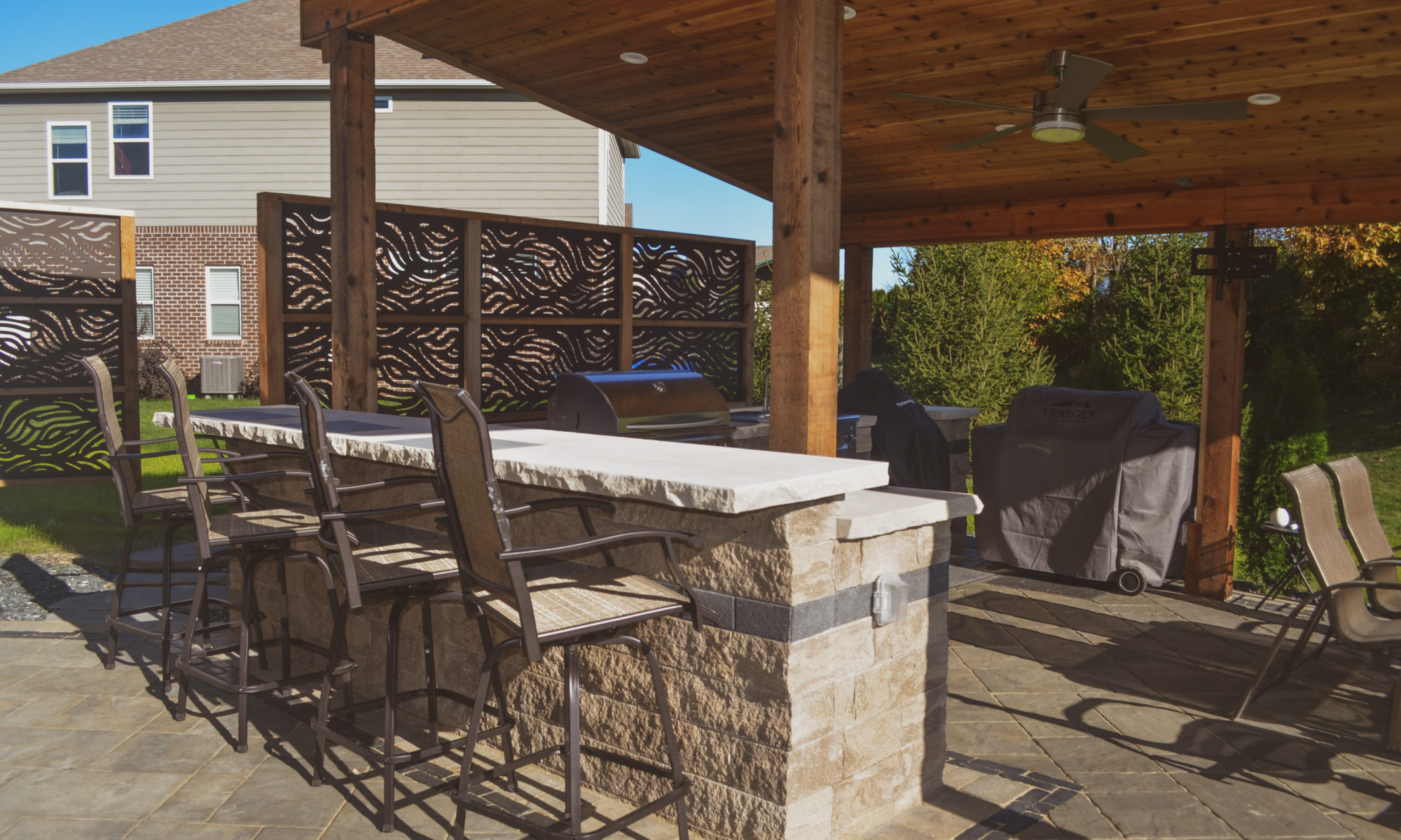Precision Outdoors Emerald Ridge Hideaway shed roof structure paver patio outdoor kitchen barter seating privacy screens walking stone indianapolis indiana privacy screens