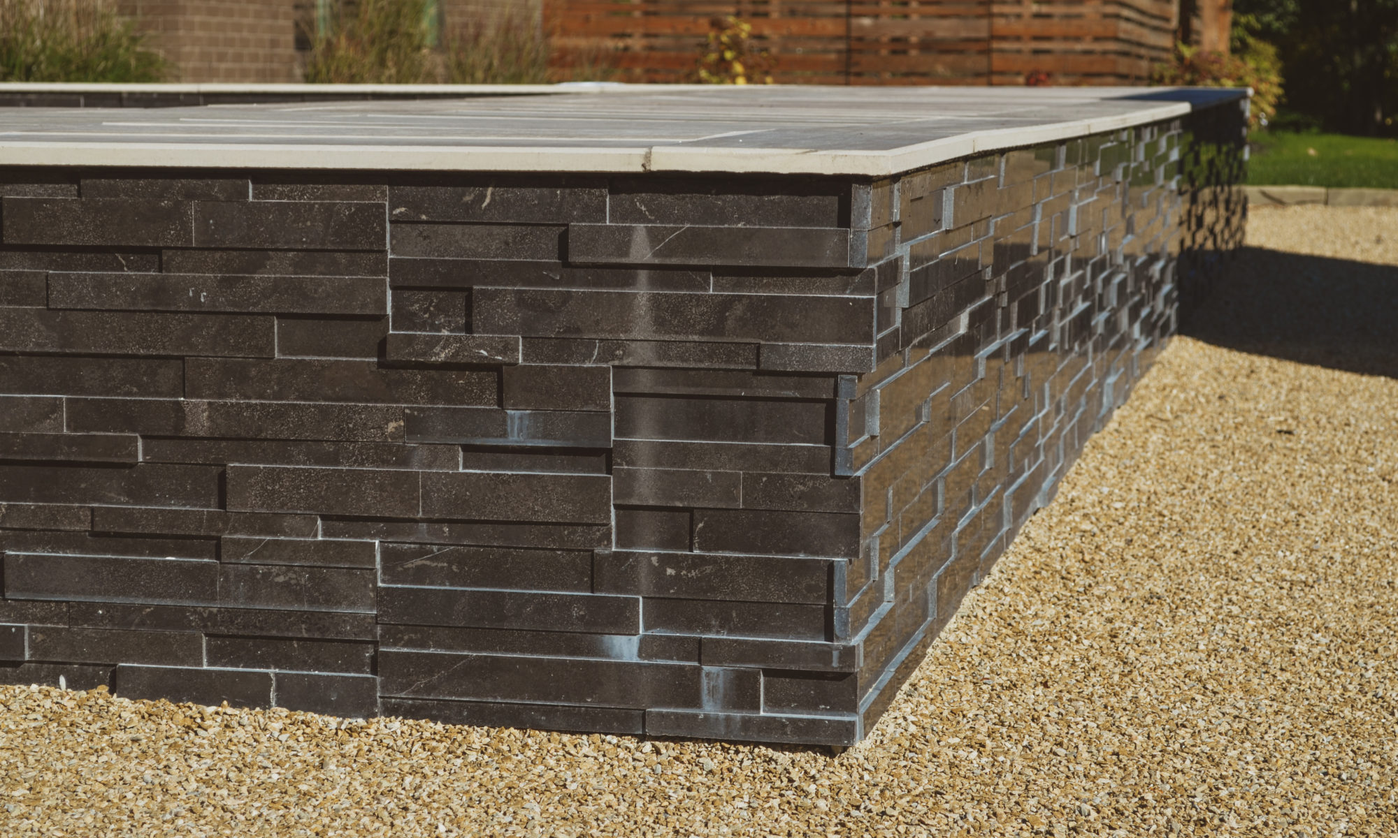Precision Outdoors Carmel Art Silo Deck custom water feature outdoor living by Belgard noon tile pool deck custom landscaping Carmel indiana dream backyard goals
