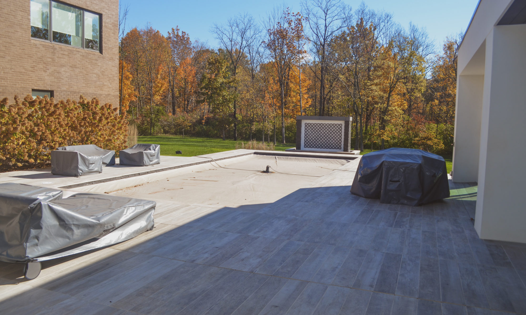 Precision Outdoors Carmel Art Silo Deck custom water feature outdoor living by Belgard noon tile pool deck custom landscaping Carmel indiana dream backyard goals