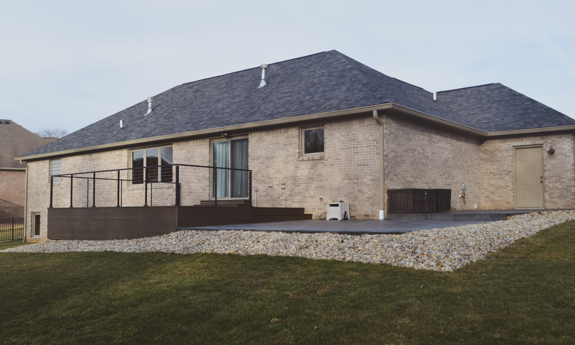 Precision Outdoors Stamped Concrete patio and deck paver patio deck composite railing stone Danville indiana simple clean backyard exterior