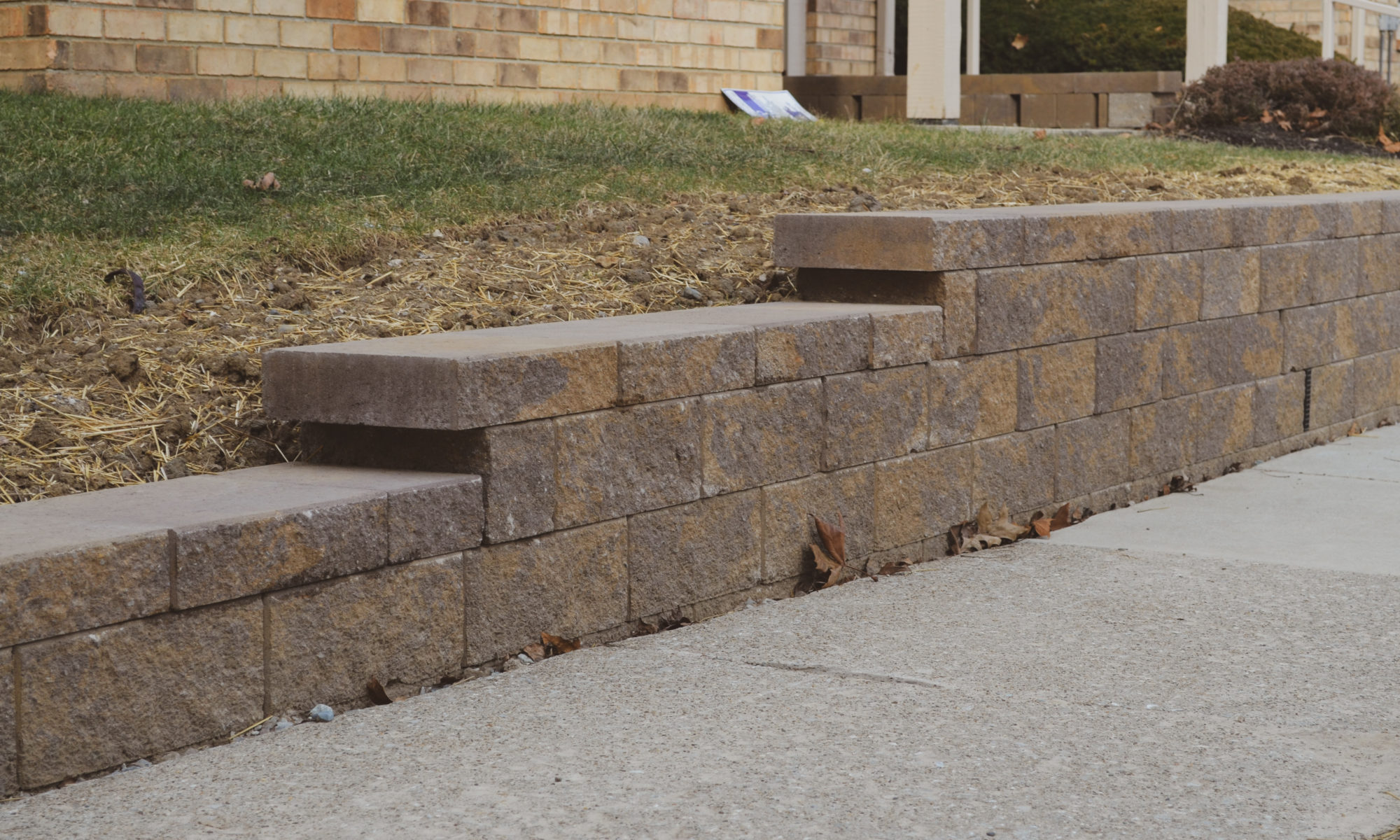 Precision Outdoors Mission Hills Apartments Gable Roof Structure Linear gas firepit paver patio seating wall Carmel indiana curb appeal