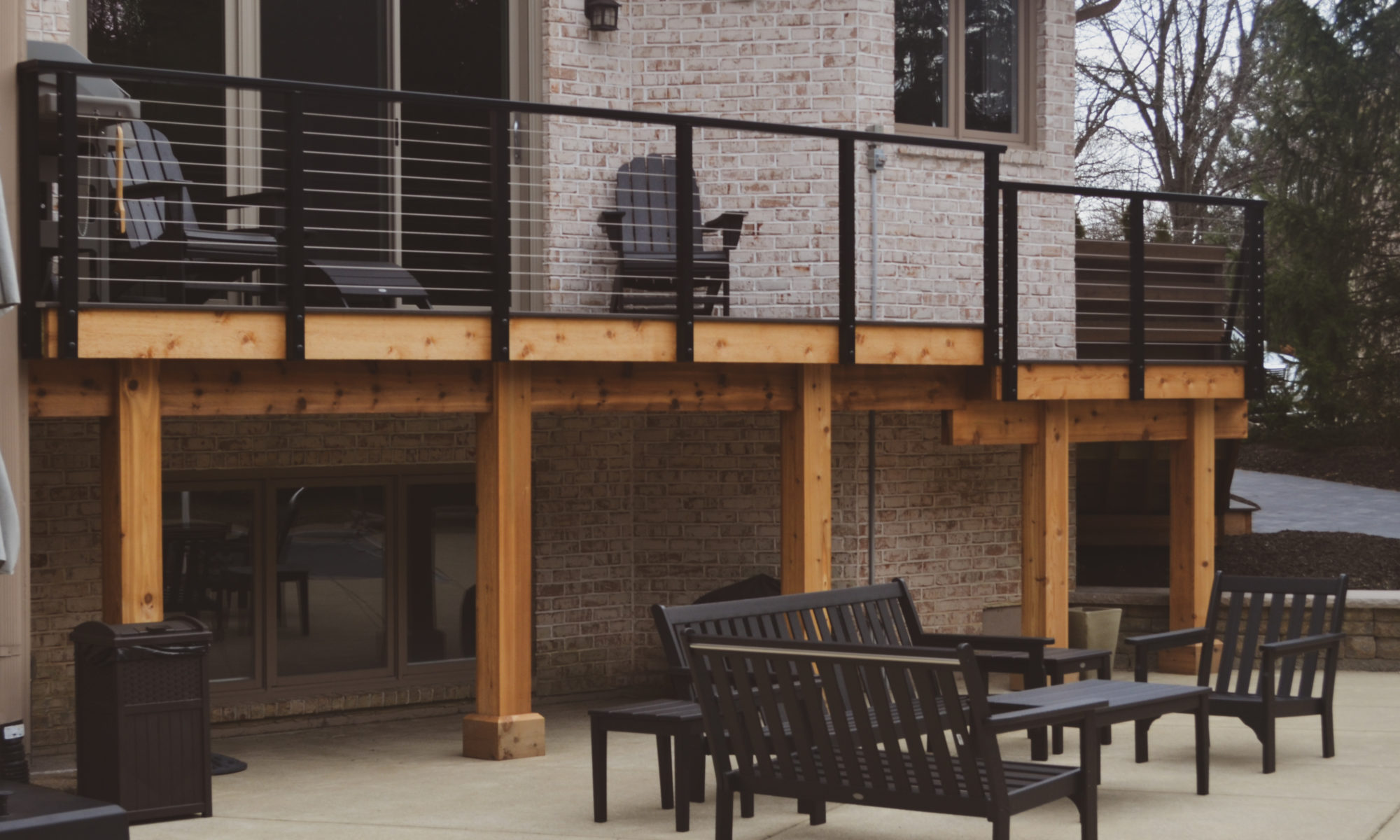 Precision Outdoors Sunken Paver Patio raised deck retaining wall terraced landscaping beds Zionsville indiana beautiful backyard