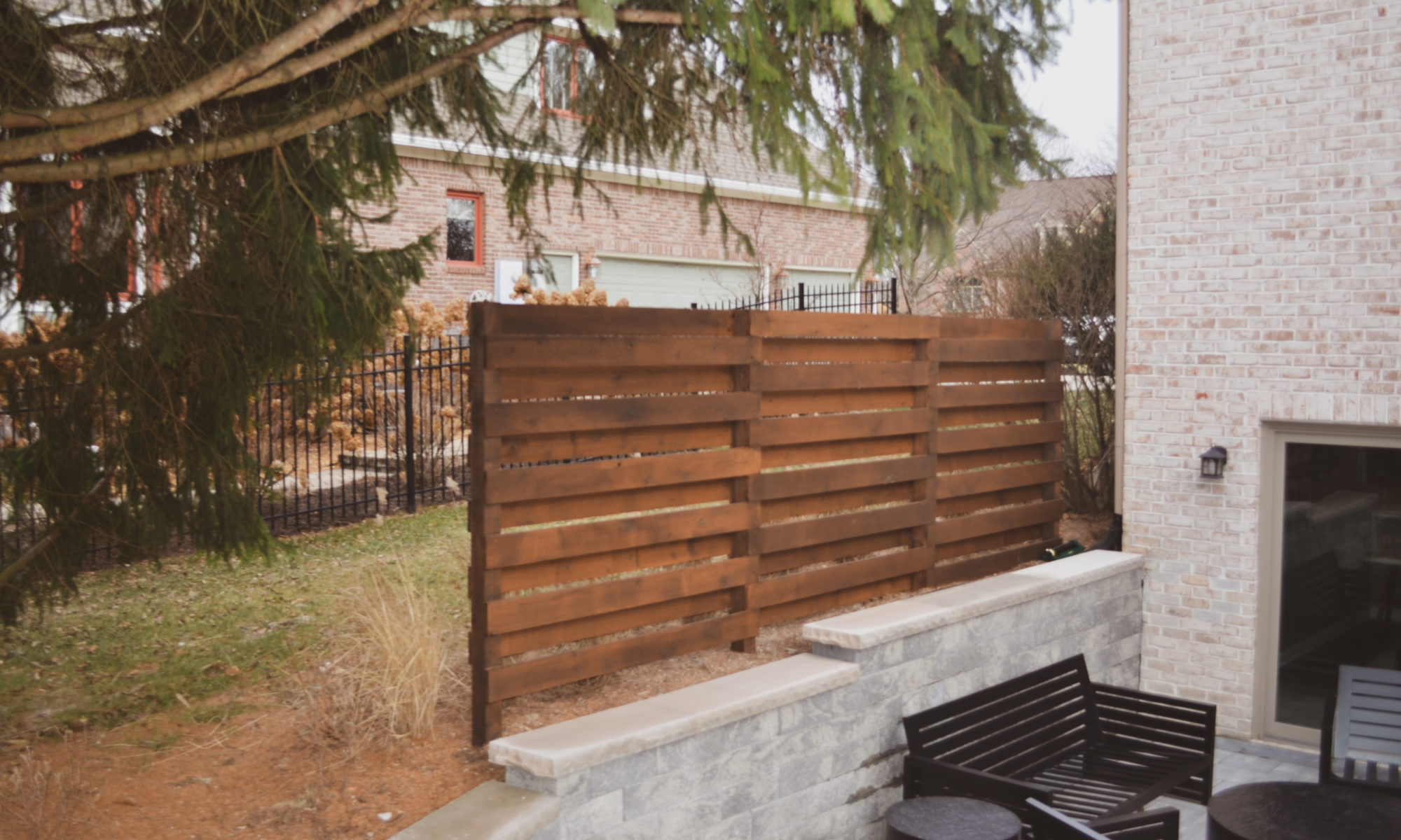 Precision Outdoors Sunken Paver Patio raised deck retaining wall terraced landscaping beds Zionsville indiana beautiful backyard