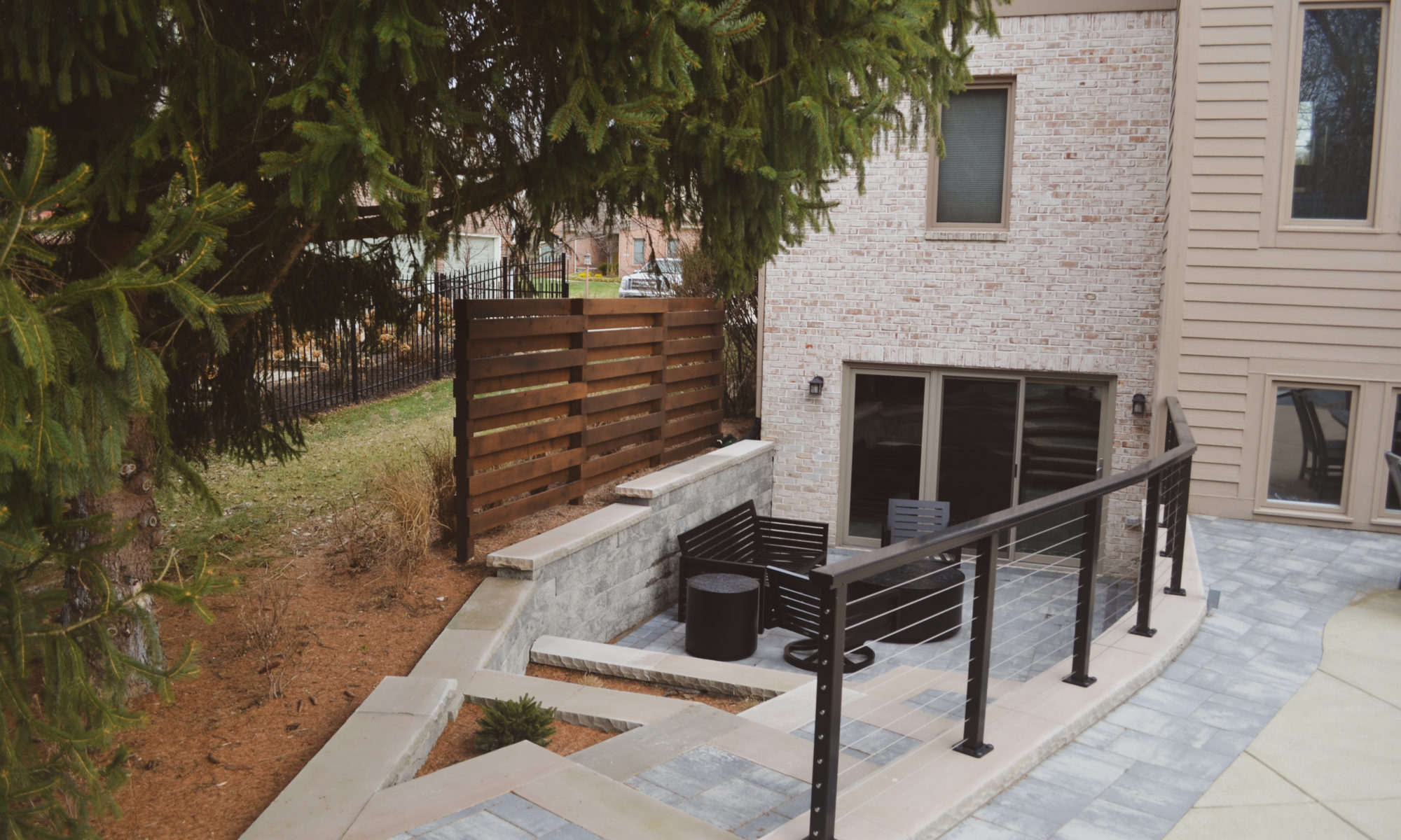 Precision Outdoors Sunken Paver Patio raised deck retaining wall terraced landscaping beds Zionsville indiana beautiful backyard
