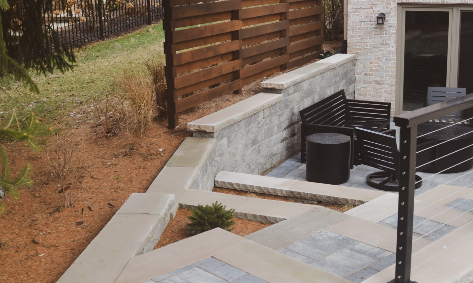 Precision Outdoors Sunken Paver Patio raised deck retaining wall terraced landscaping beds Zionsville indiana beautiful backyard