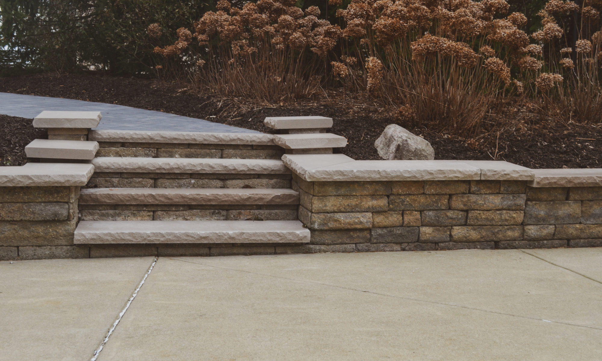Precision Outdoors Sunken Paver Patio raised deck retaining wall terraced landscaping beds Zionsville indiana beautiful backyard