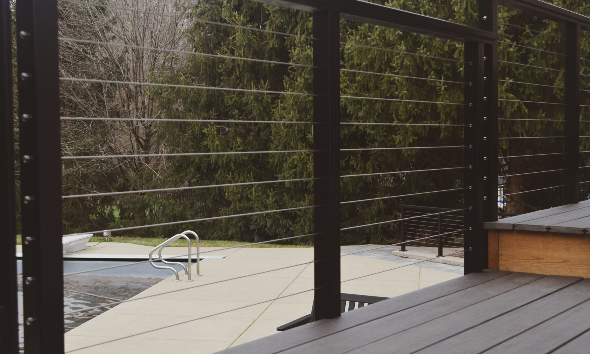 Precision Outdoors Sunken Paver Patio raised deck retaining wall terraced landscaping beds Zionsville indiana beautiful backyard