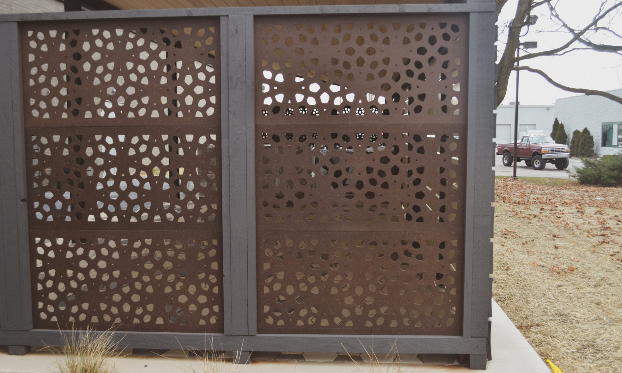 Precision outdoors sophisticated commercial property paver patio modern step walkway cable railing large outdoor dining space outdoor kitchen sink grill miniature refrigerator mini fridge extra seating bar decorative sunscreen sunscreens indianapolis indiana