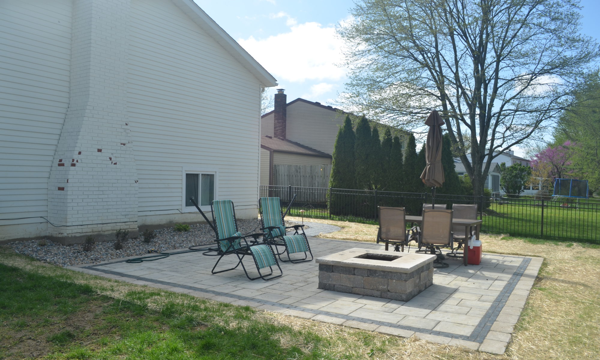 Precision Outdoors Dual Patios Plainfield Indiana Grilling patio dining patio firepit fire pit paver walkway landscaping outdoor space beautiful backyard summer grilling outside pavers patios secluded separate patios