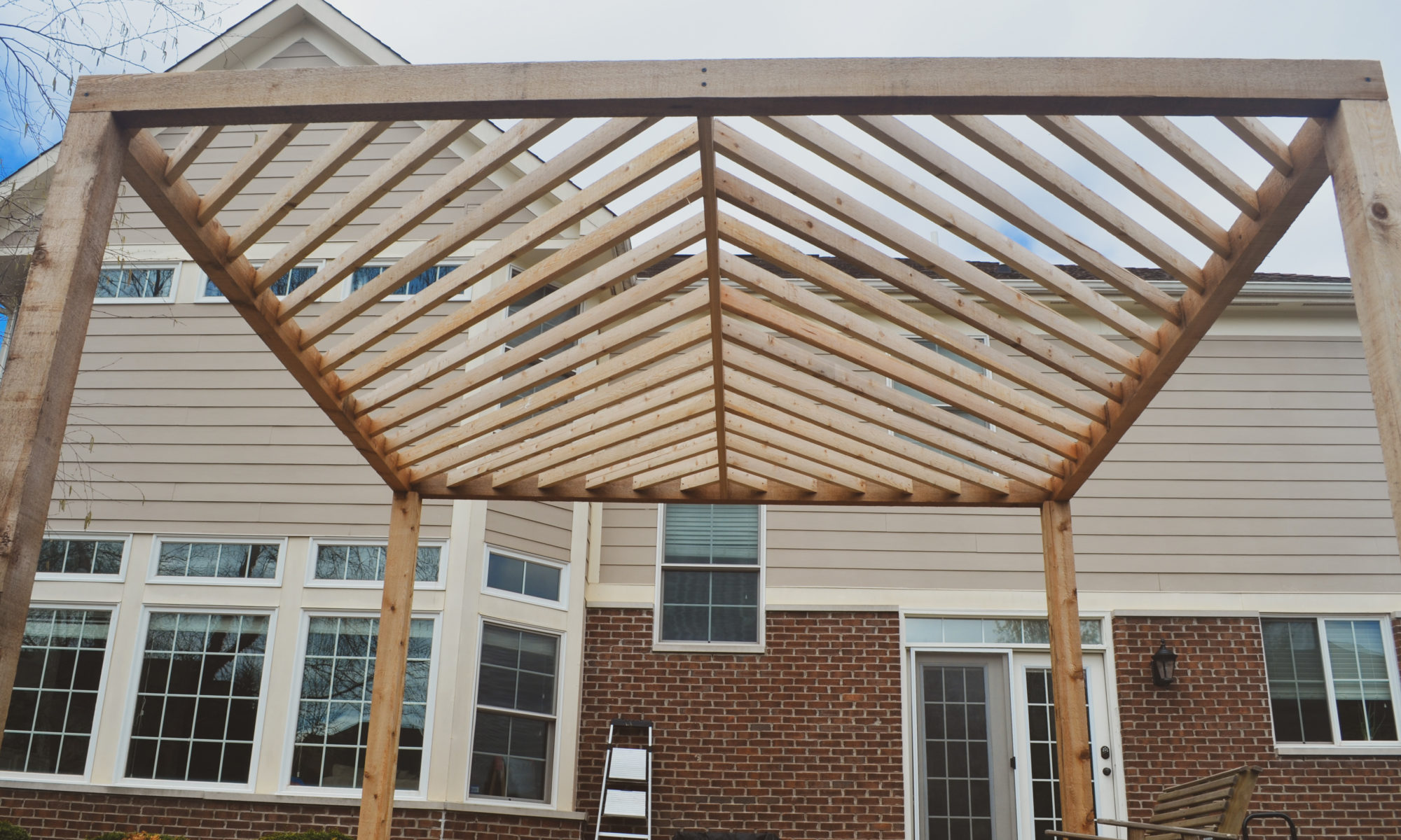 Modern Elegance Pergola precision outdoors Westfield indiana fire pit paver patio landscaping custom backyard diagonal design exterior build beautiful