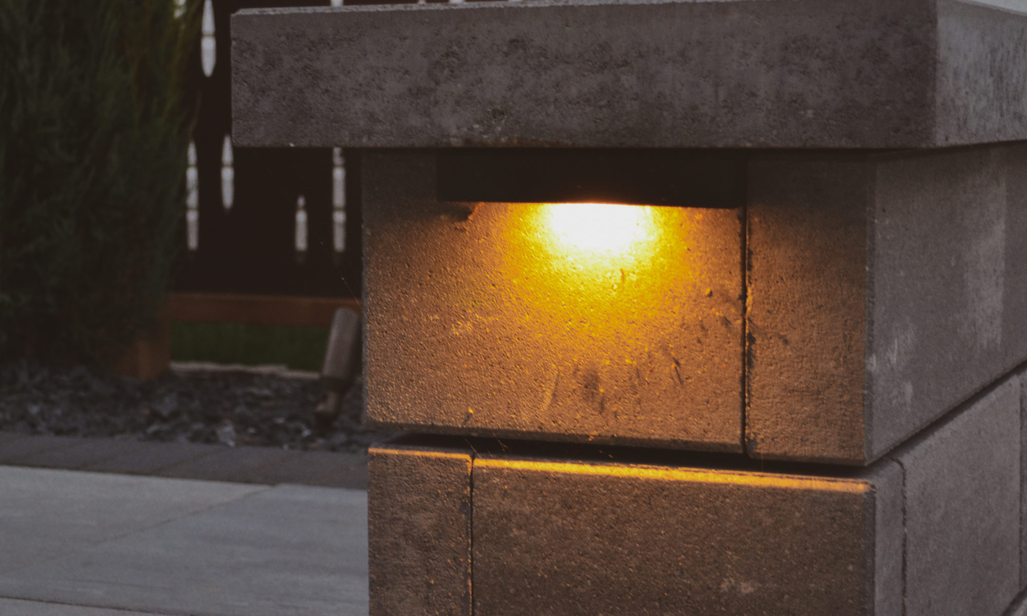 The Private Plaza privacy screens custom landscaping fire pit arborvitae private dining privacy Carmel indiana landscaping walkway Night Lighting