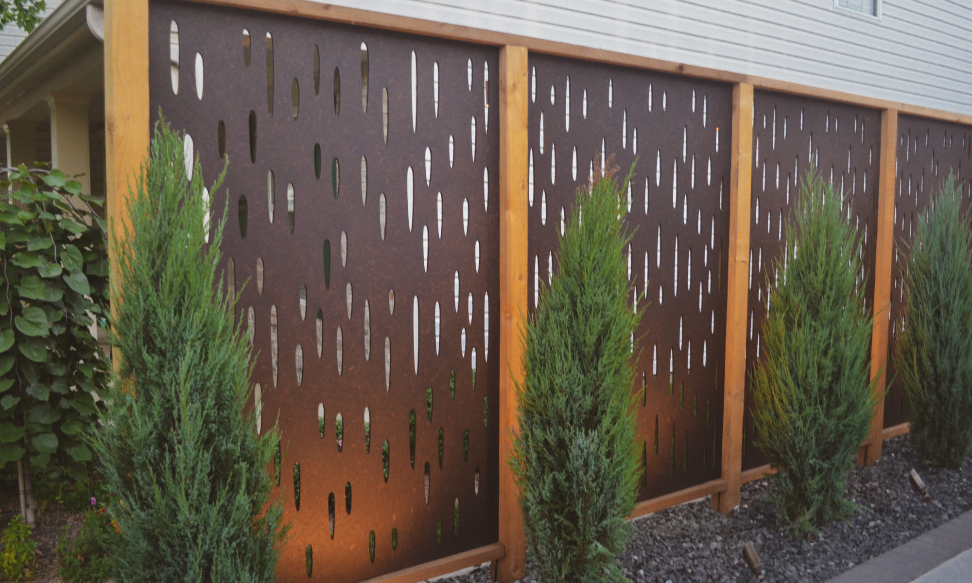 The Private Plaza privacy screens custom landscaping fire pit arborvitae private dining privacy Carmel indiana landscaping walkway Night Lighting