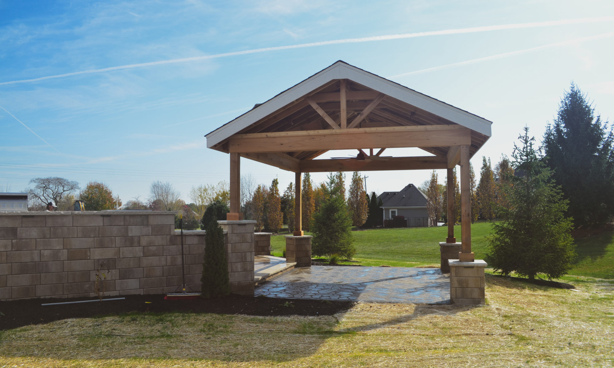 Gables at Hickory Stick Greenwood Bargersville Indiana Paver Patio Gas burning fire pit exterior build dream backyard gable roof structure walkway custom custom landscaping outdoor kitchen mini fridge mini refrigerator fan lighting grill