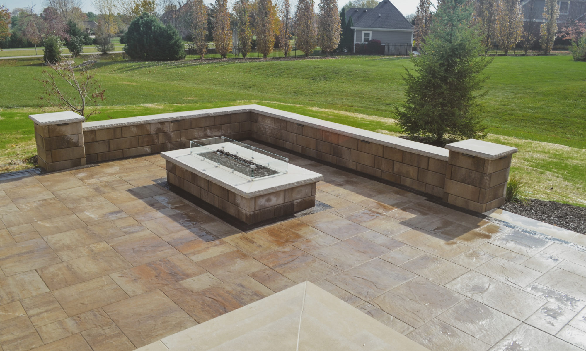 Gables at Hickory Stick Greenwood Bargersville Indiana Paver Patio Gas burning fire pit exterior build dream backyard gable roof structure walkway custom custom landscaping outdoor kitchen mini fridge mini refrigerator fan lighting grill