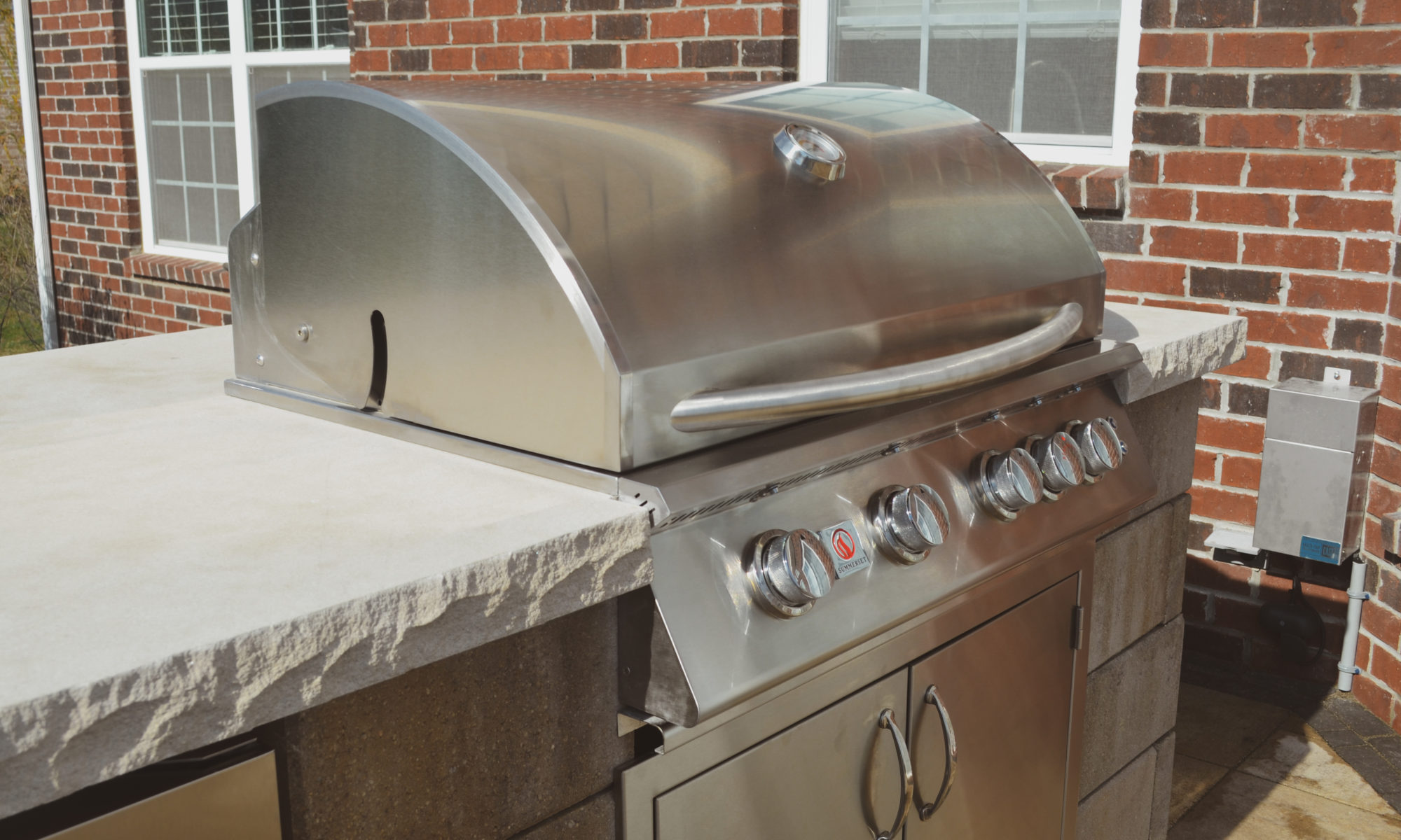 Gables at Hickory Stick Greenwood Bargersville Indiana Paver Patio Gas burning fire pit exterior build dream backyard gable roof structure walkway custom custom landscaping outdoor kitchen mini fridge mini refrigerator fan lighting grill