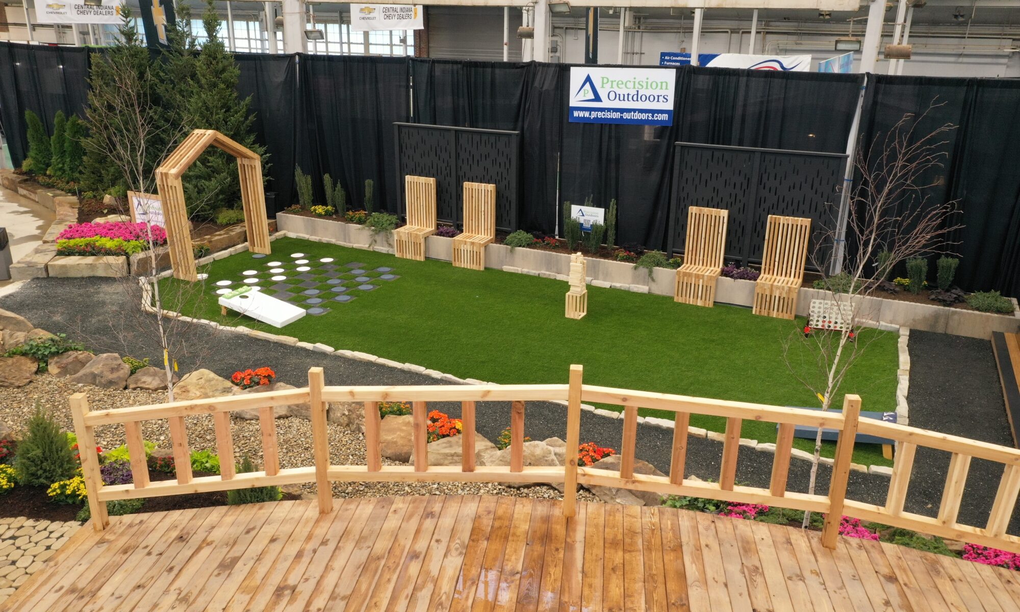 Precision Outdoors Flower and patio show 2023 indianapolis exterior build backyard goals dream backyard the smart pergola belgard plants shrubs tree water features bridge rock pavers paver fire pit lawn games connect four giant jingo astroturf astro turf traditional pergola modern pergola honeycomb tile checkers corn hole precision stone walkway inground in ground trampoline wooden playhouse woodman playhouses custom outdoor pitching dining cedar fountain beautiful display boulders boulder private privacy screen screens cozy entertainment entertaining precision design services