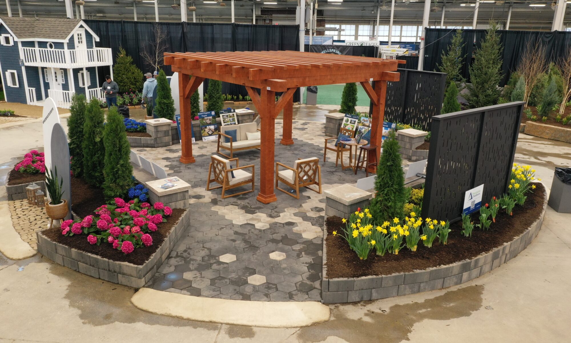 Precision Outdoors Flower and patio show 2023 indianapolis exterior build backyard goals dream backyard the smart pergola belgard plants shrubs tree water features bridge rock pavers paver fire pit lawn games connect four giant jingo astroturf astro turf traditional pergola modern pergola honeycomb tile checkers corn hole precision stone walkway inground in ground trampoline wooden playhouse woodman playhouses custom outdoor pitching dining cedar fountain beautiful display boulders boulder private privacy screen screens cozy entertainment entertaining precision design services