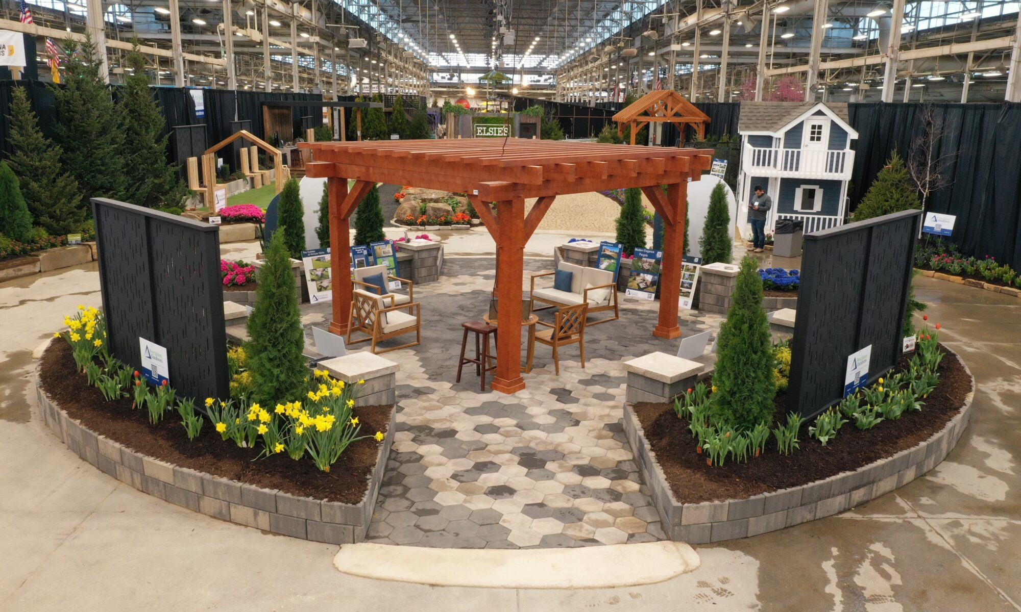 Precision Outdoors Flower and patio show 2023 indianapolis exterior build backyard goals dream backyard the smart pergola belgard plants shrubs tree water features bridge rock pavers paver fire pit lawn games connect four giant jingo astroturf astro turf traditional pergola modern pergola honeycomb tile checkers corn hole precision stone walkway inground in ground trampoline wooden playhouse woodman playhouses custom outdoor pitching dining cedar fountain beautiful display boulders boulder private privacy screen screens cozy entertainment entertaining precision design services